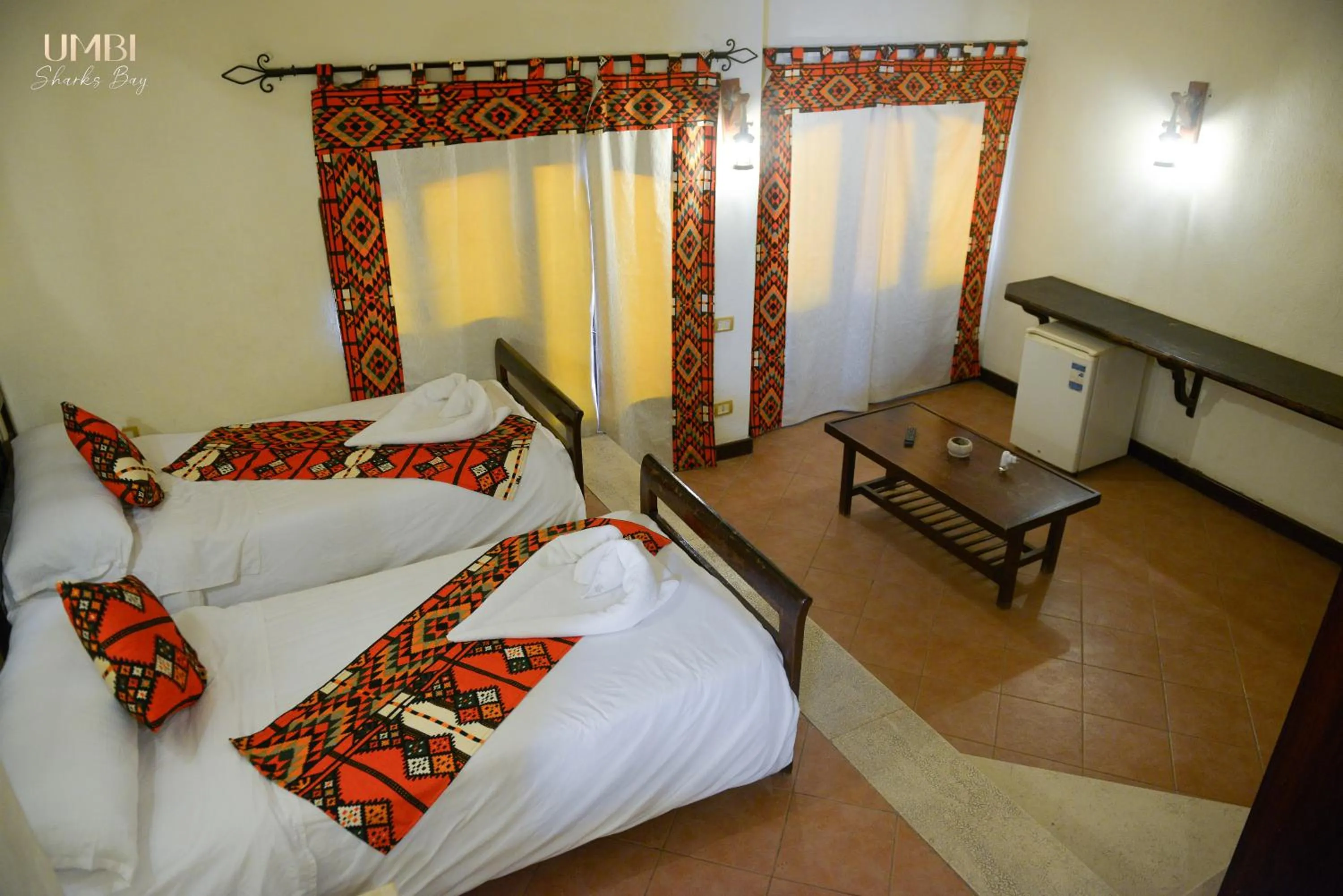 Bed in Umbi Sharks Bay Diving Village