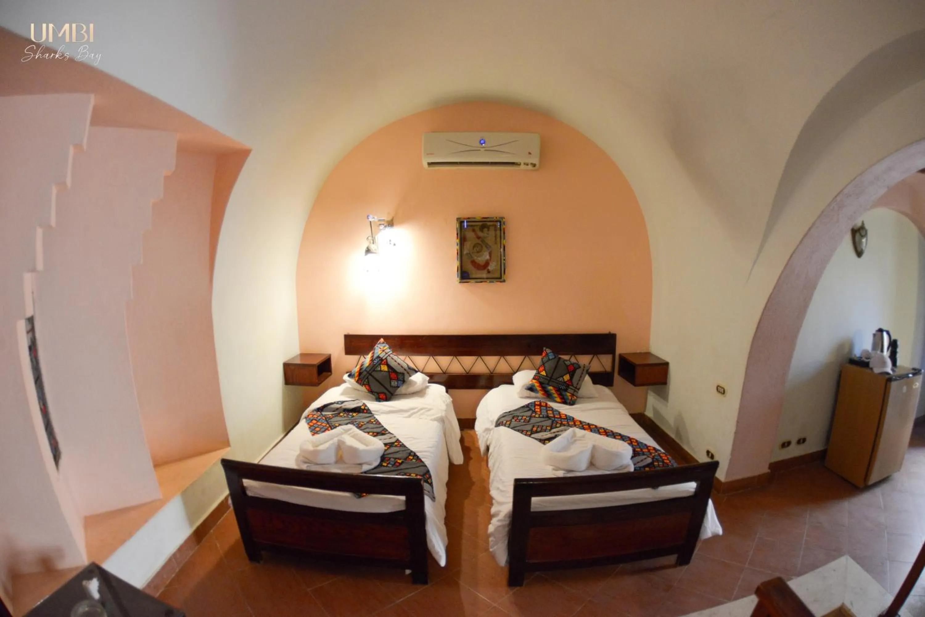 Bed in Umbi Sharks Bay Diving Village