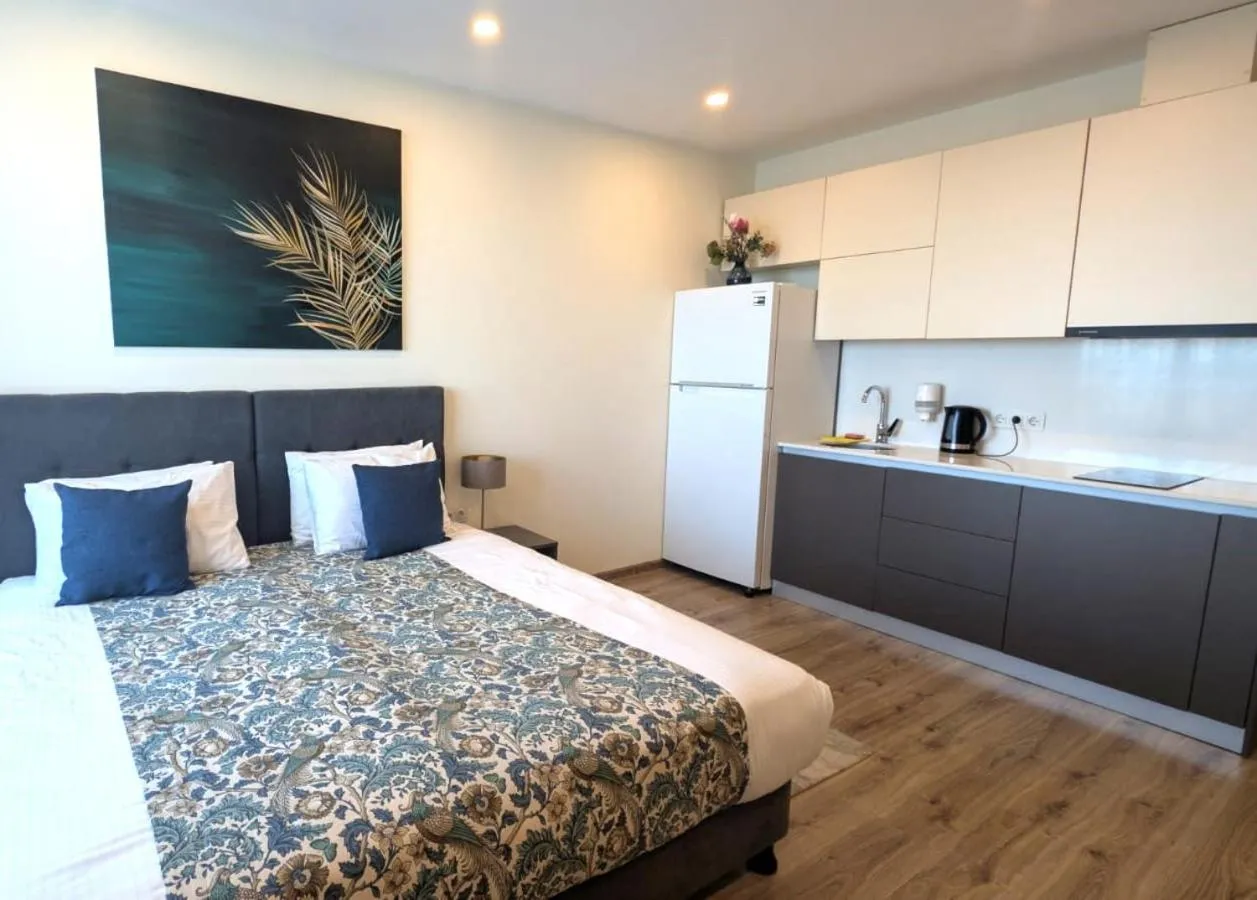 Bed in Bellevue Residence Suites