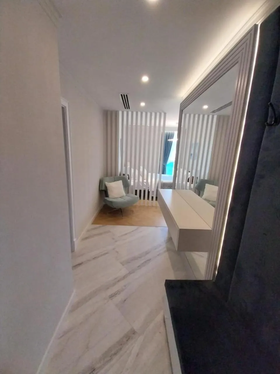 Living room, Bed in Bellevue Residence Suites