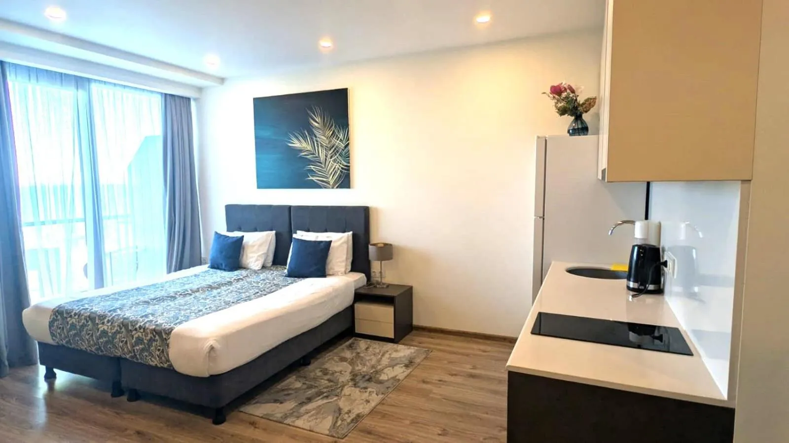 Bed in Bellevue Residence Suites