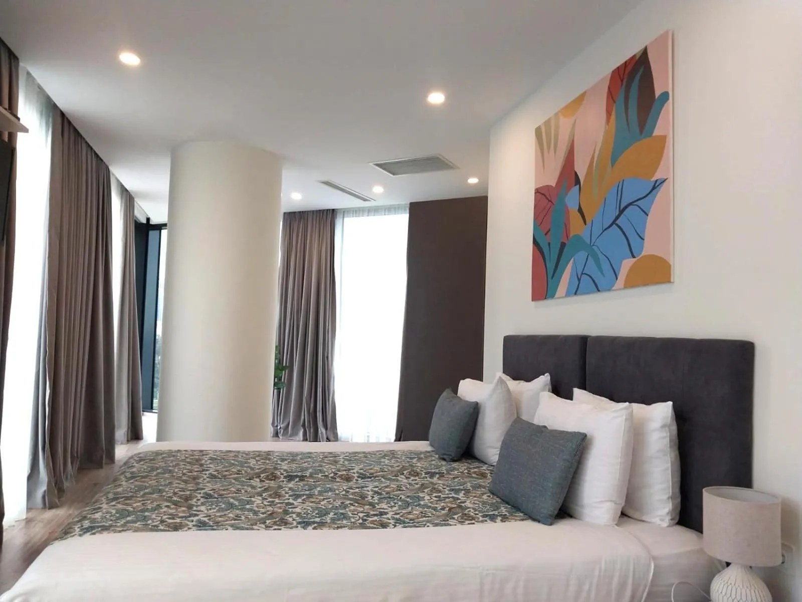 Bed in Bellevue Residence Suites