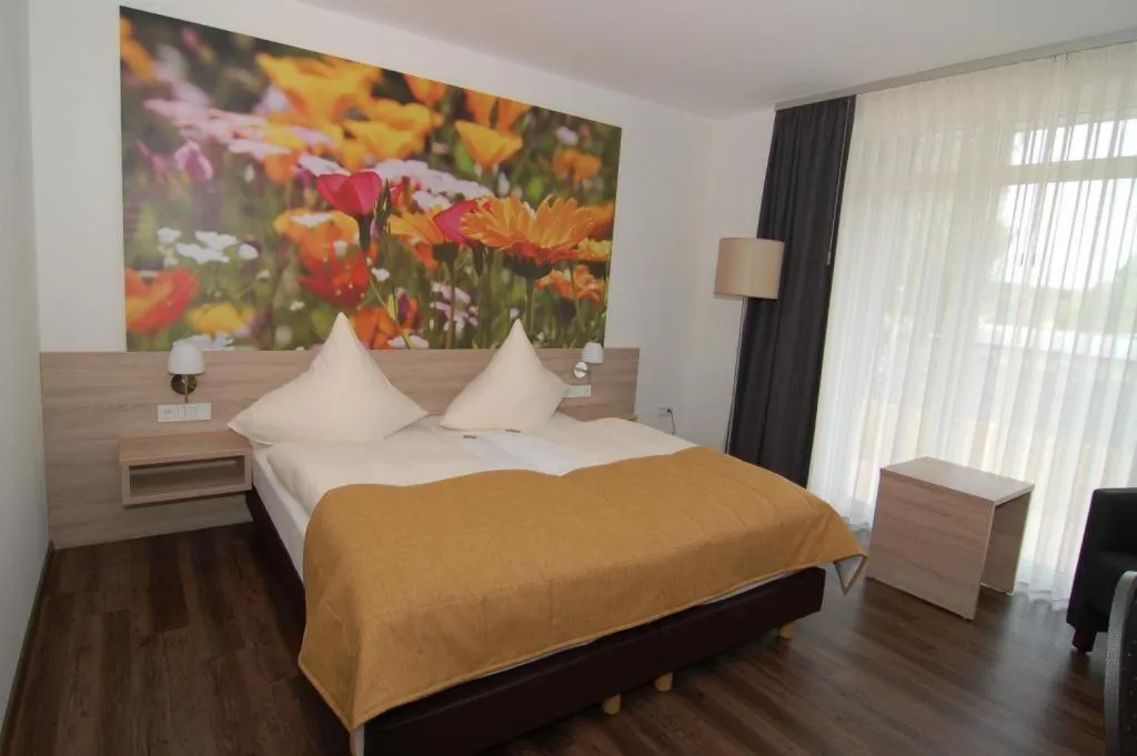 Photo of the whole room, Bed in Ringhotel Alfsee Piazza