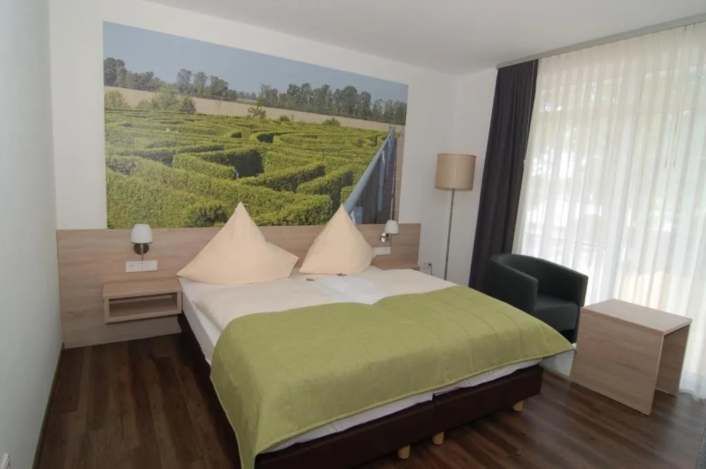 Photo of the whole room, Bed in Ringhotel Alfsee Piazza