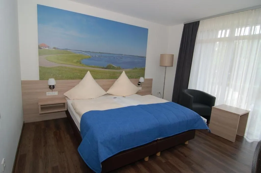 Photo of the whole room, Bed in Ringhotel Alfsee Piazza