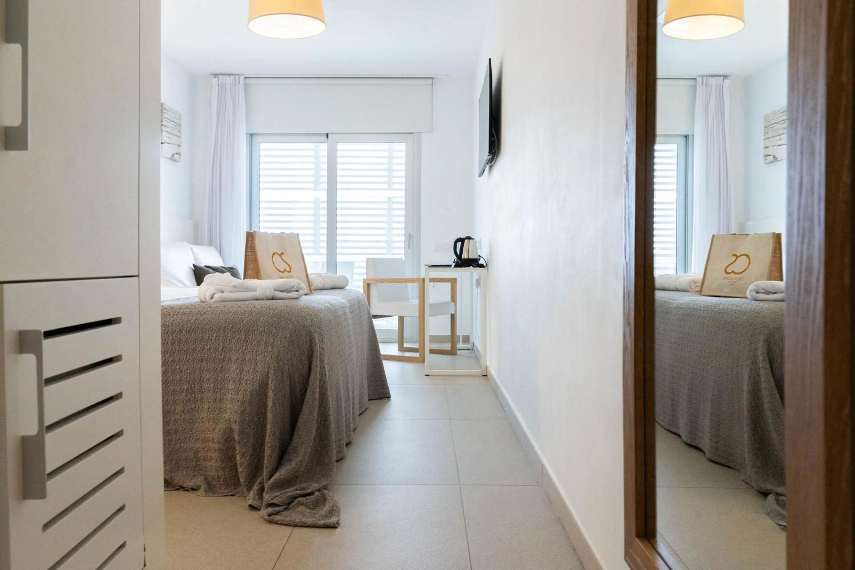 Photo of the whole room, Bed in Hotel Cala Saona & Spa