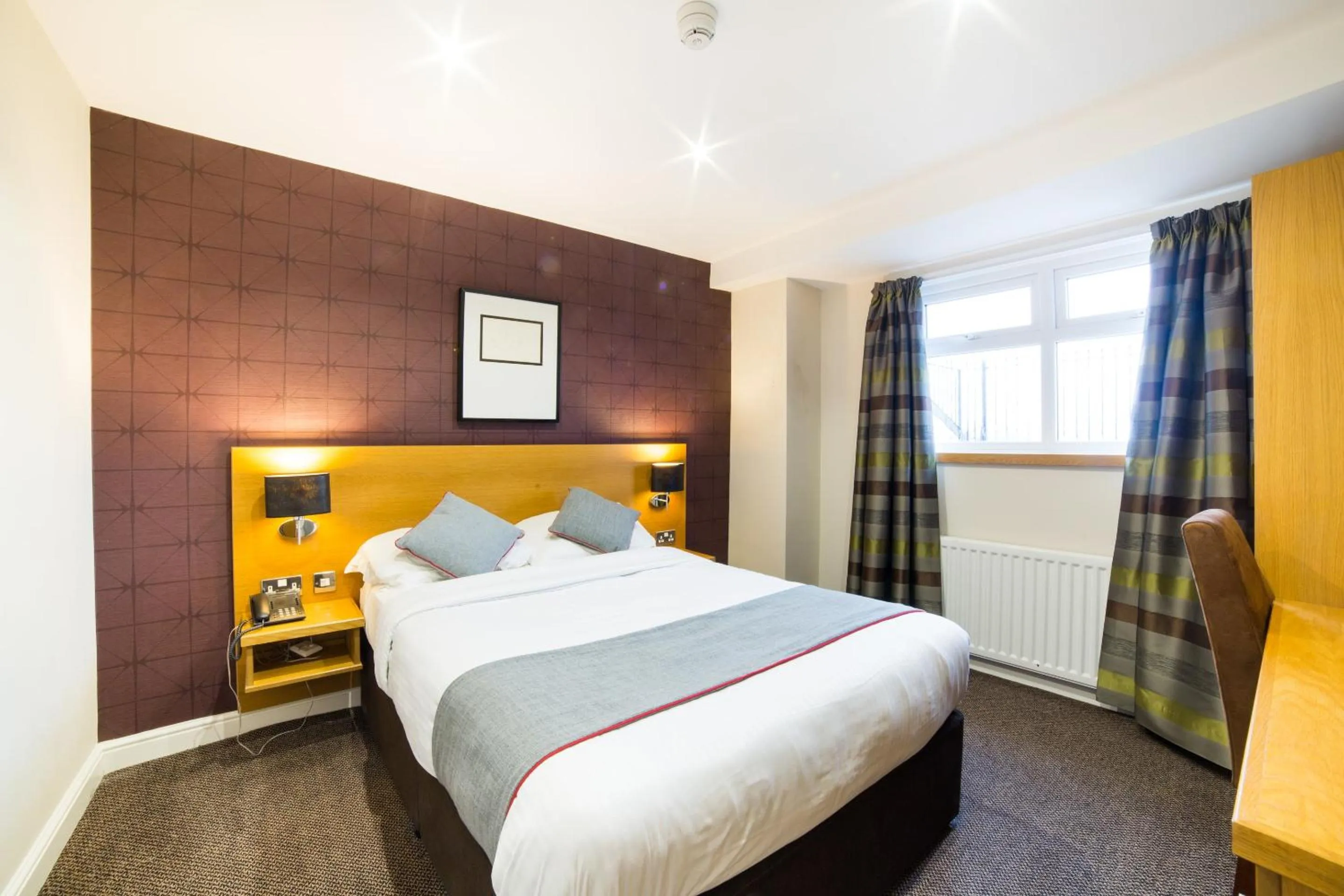 Bedroom, Bed in OYO Imperial Hotel