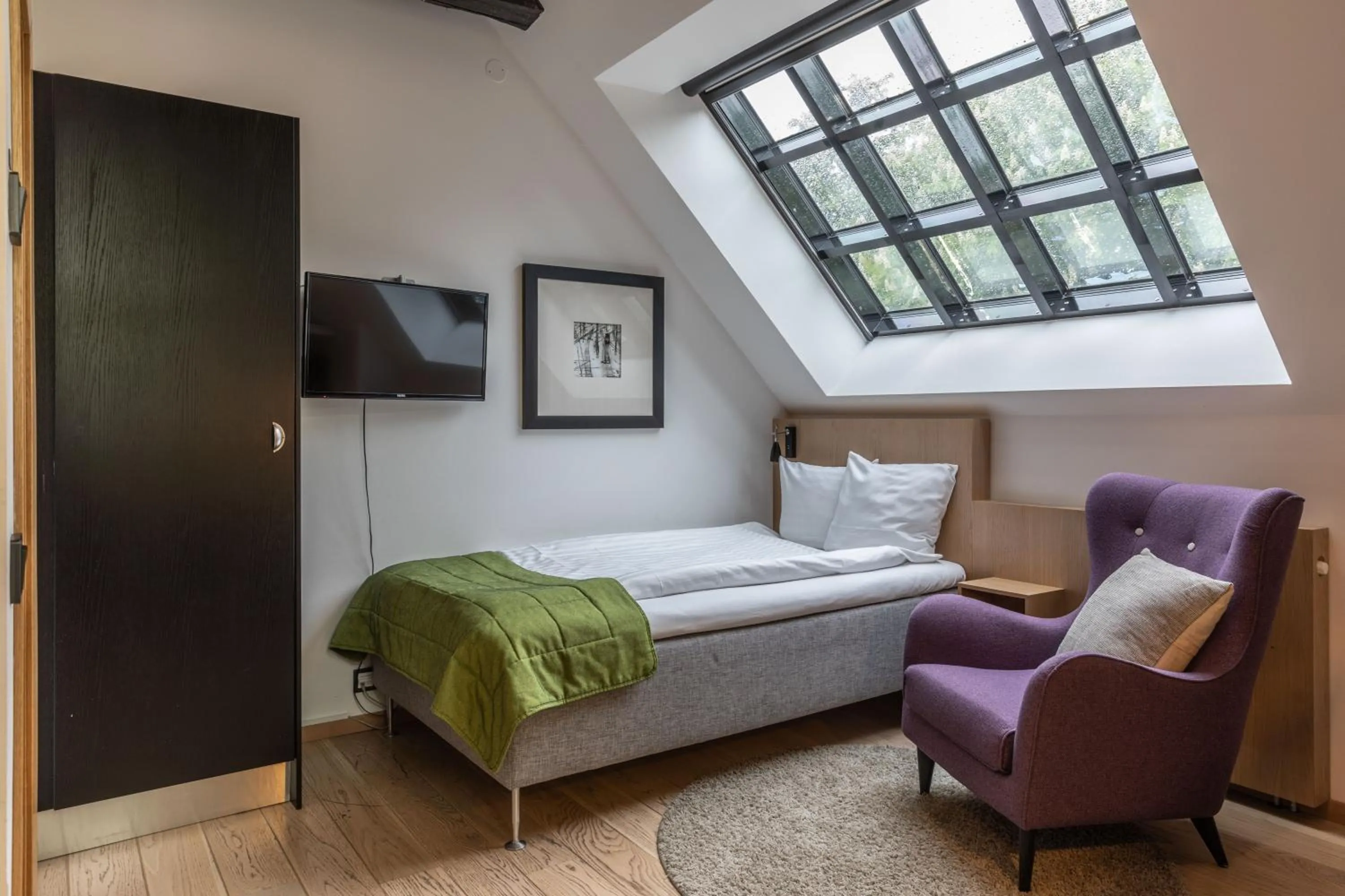 Bed in The More Hotel Lund