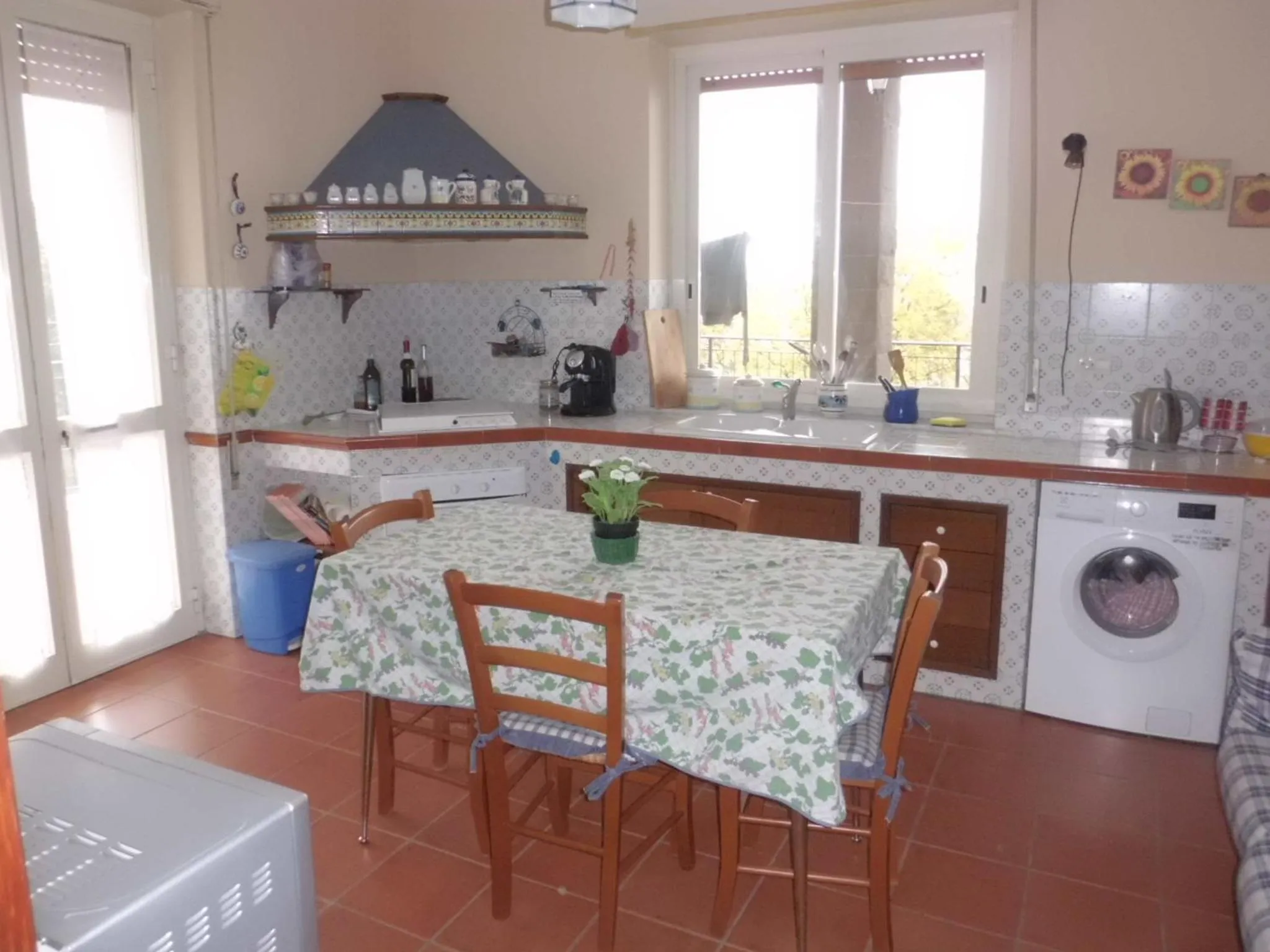 Kitchen or kitchenette in At Armando's Home