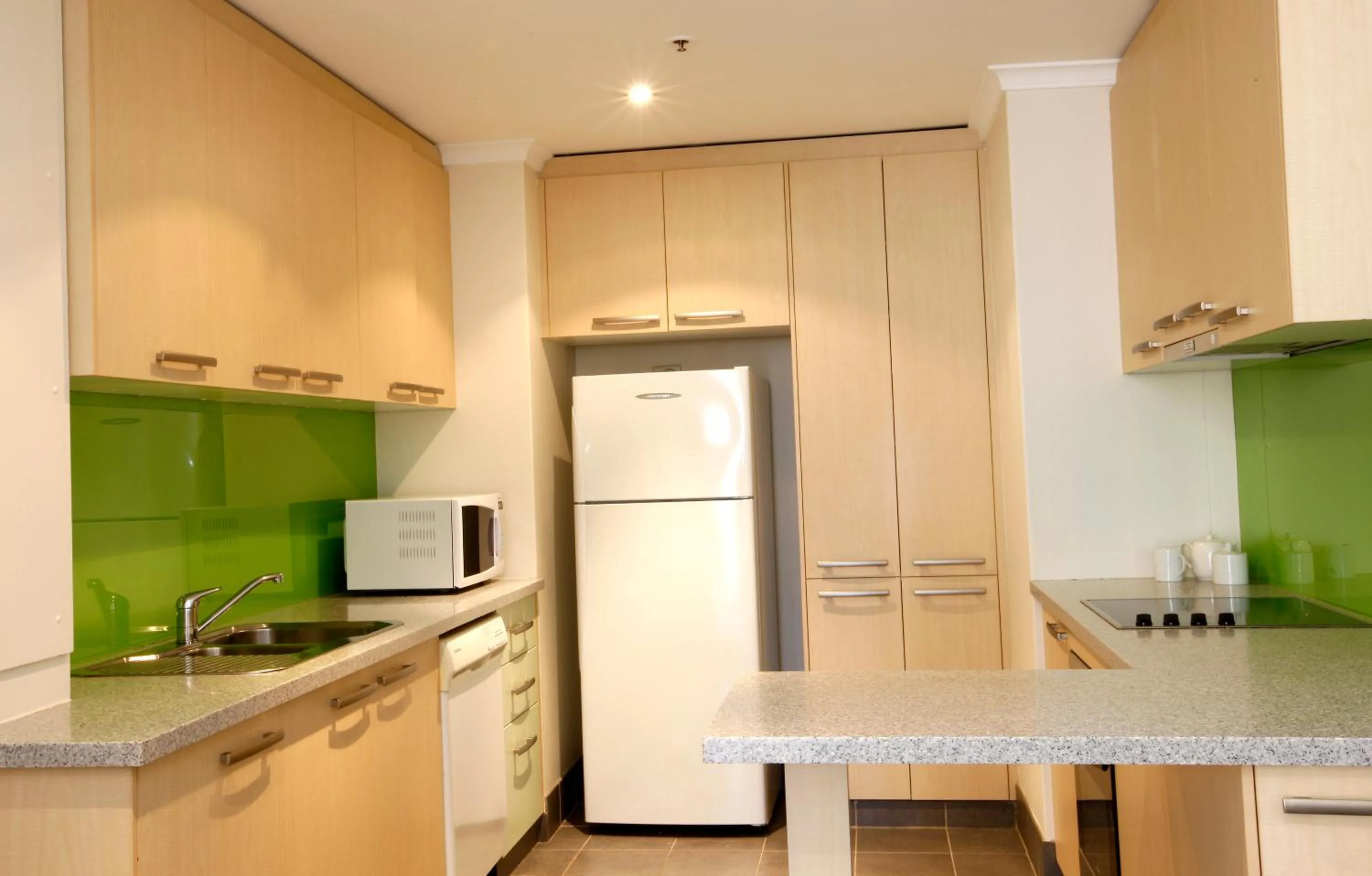 Kitchen or kitchenette in The York by Swiss-Belhotel