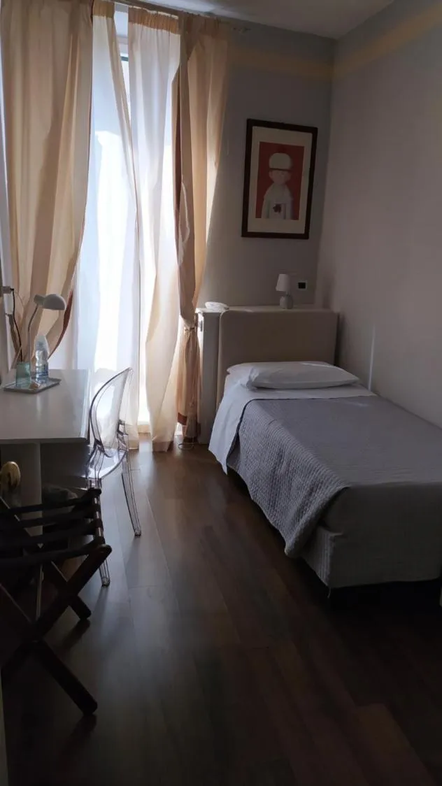 Photo of the whole room, Bed in Albergo Moderno