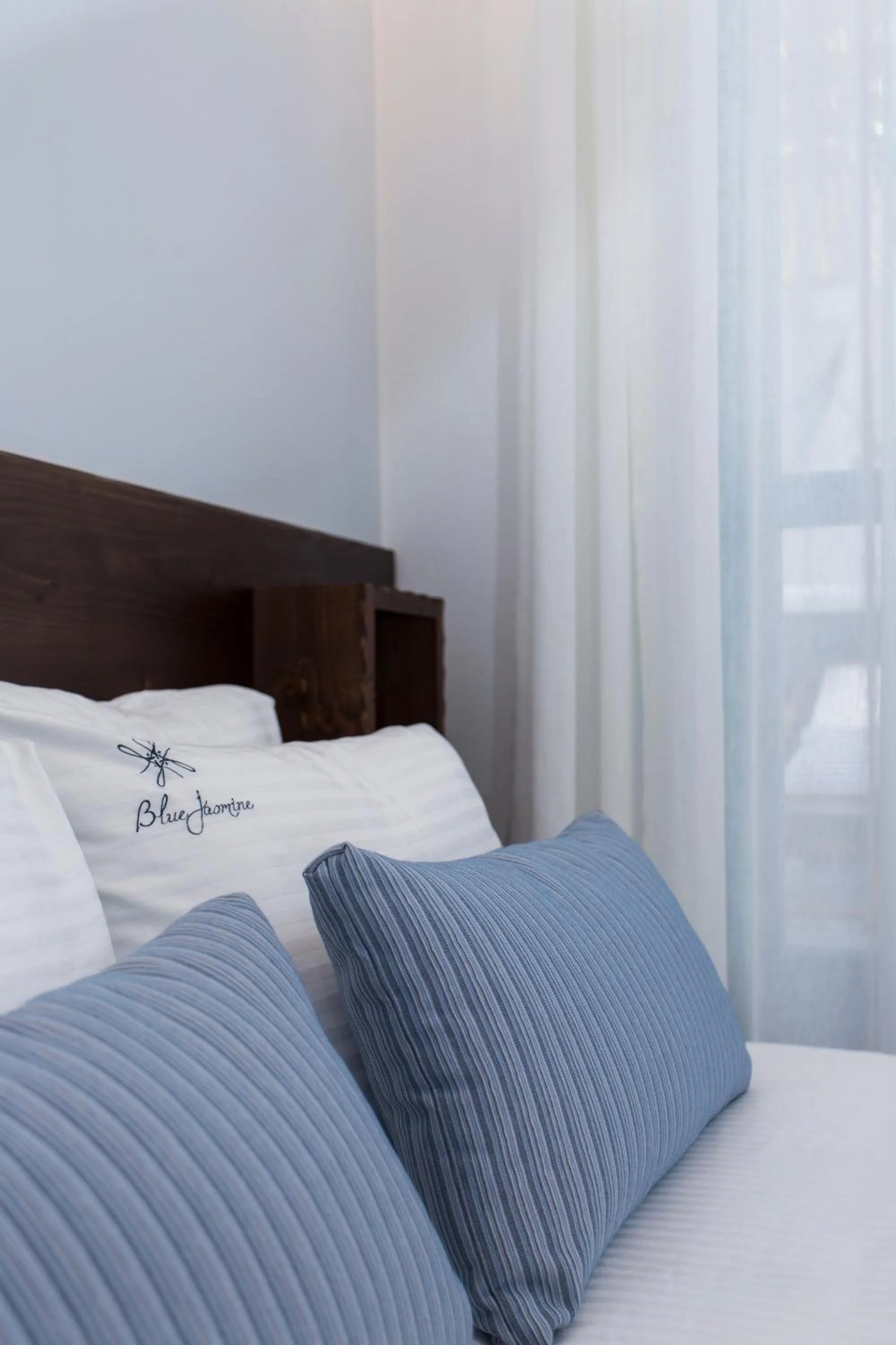 Bedroom, Bed in Blue Jasmine Suites