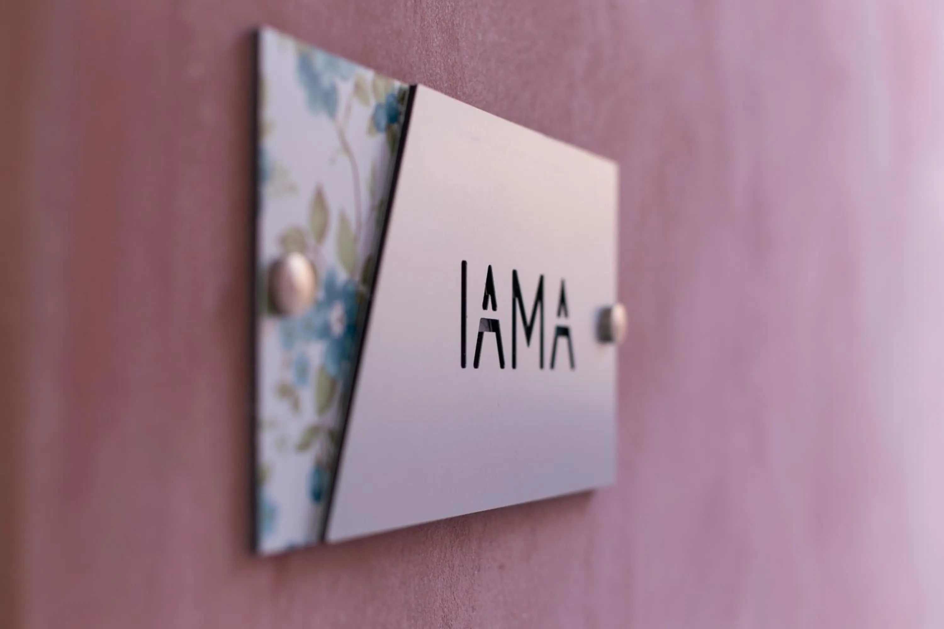 Property logo or sign in Blue Jasmine Suites