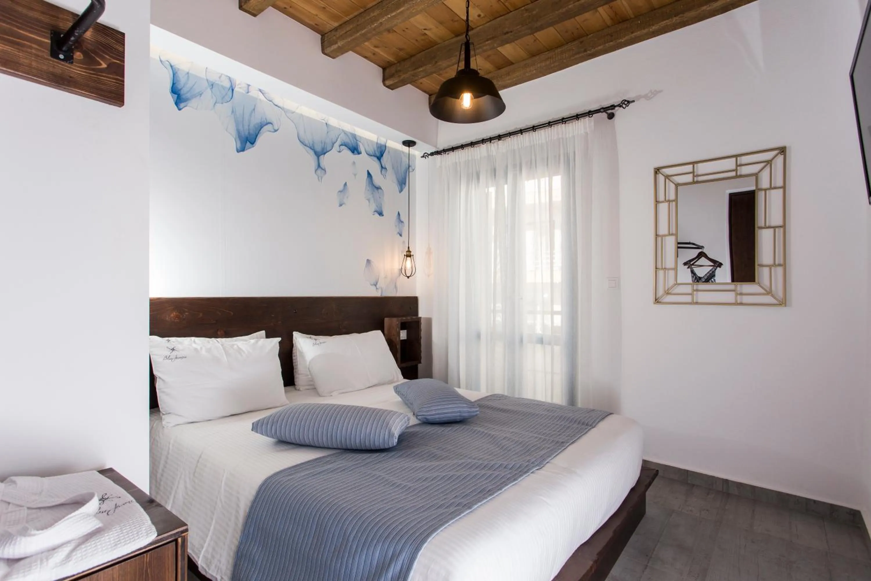 Bedroom, Bed in Blue Jasmine Suites