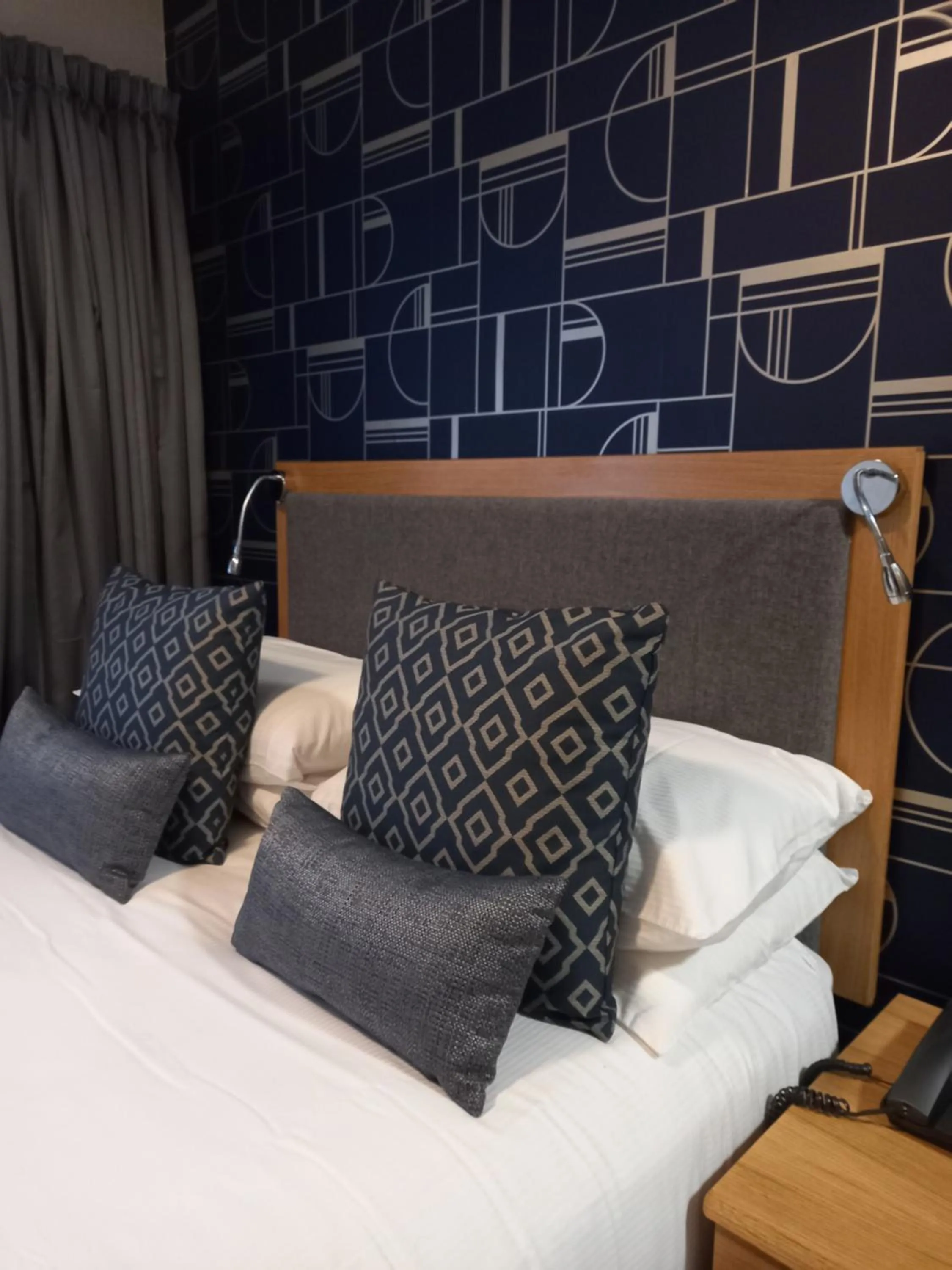 Bed in Royal Sportsman Hotel