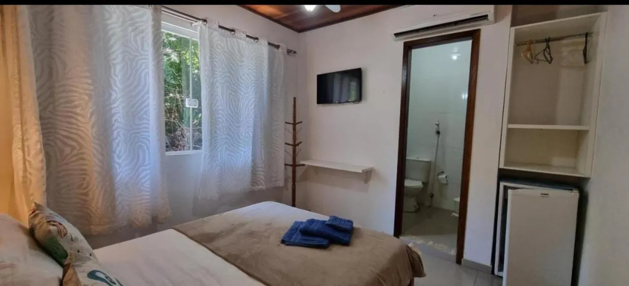 Bed in Pousada Sereia de Geriba