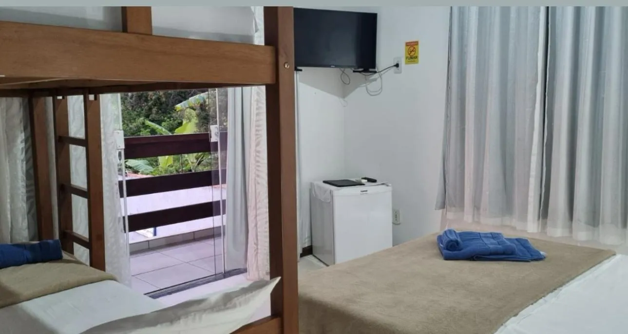 Bed in Pousada Sereia de Geriba