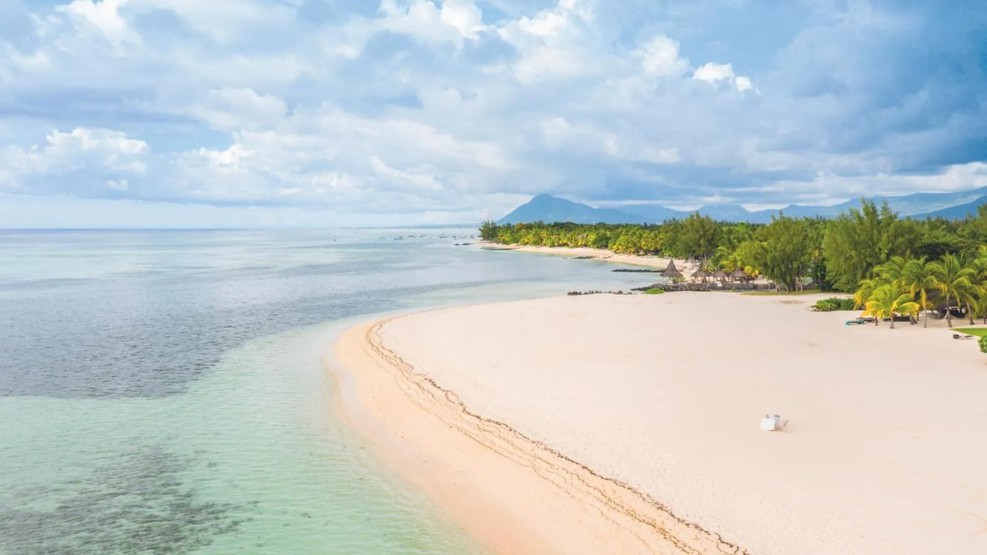 Beach in Dinarobin Beachcomber Golf Resort & Spa