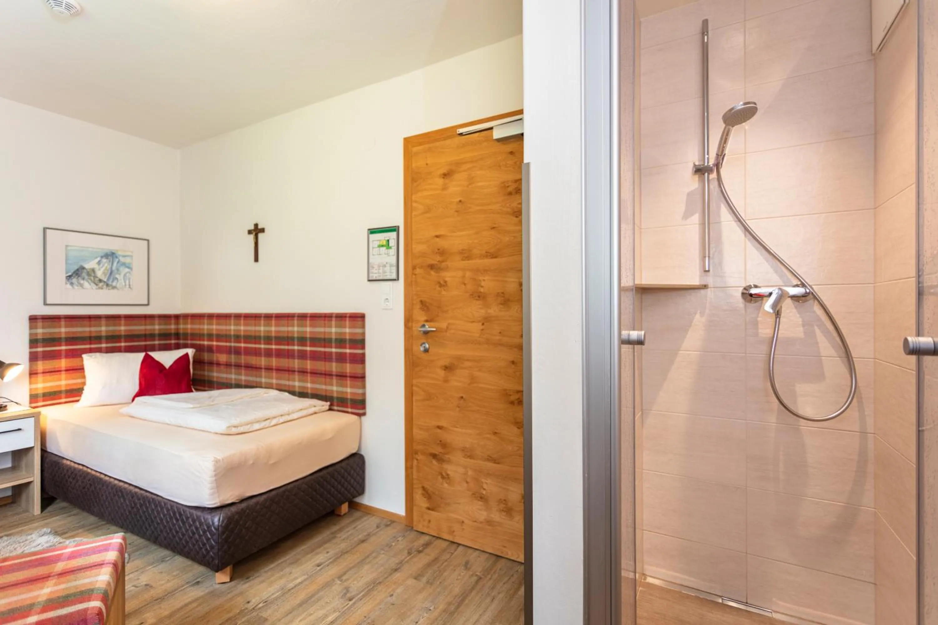Bed in Hölzl Bed & Breakfast