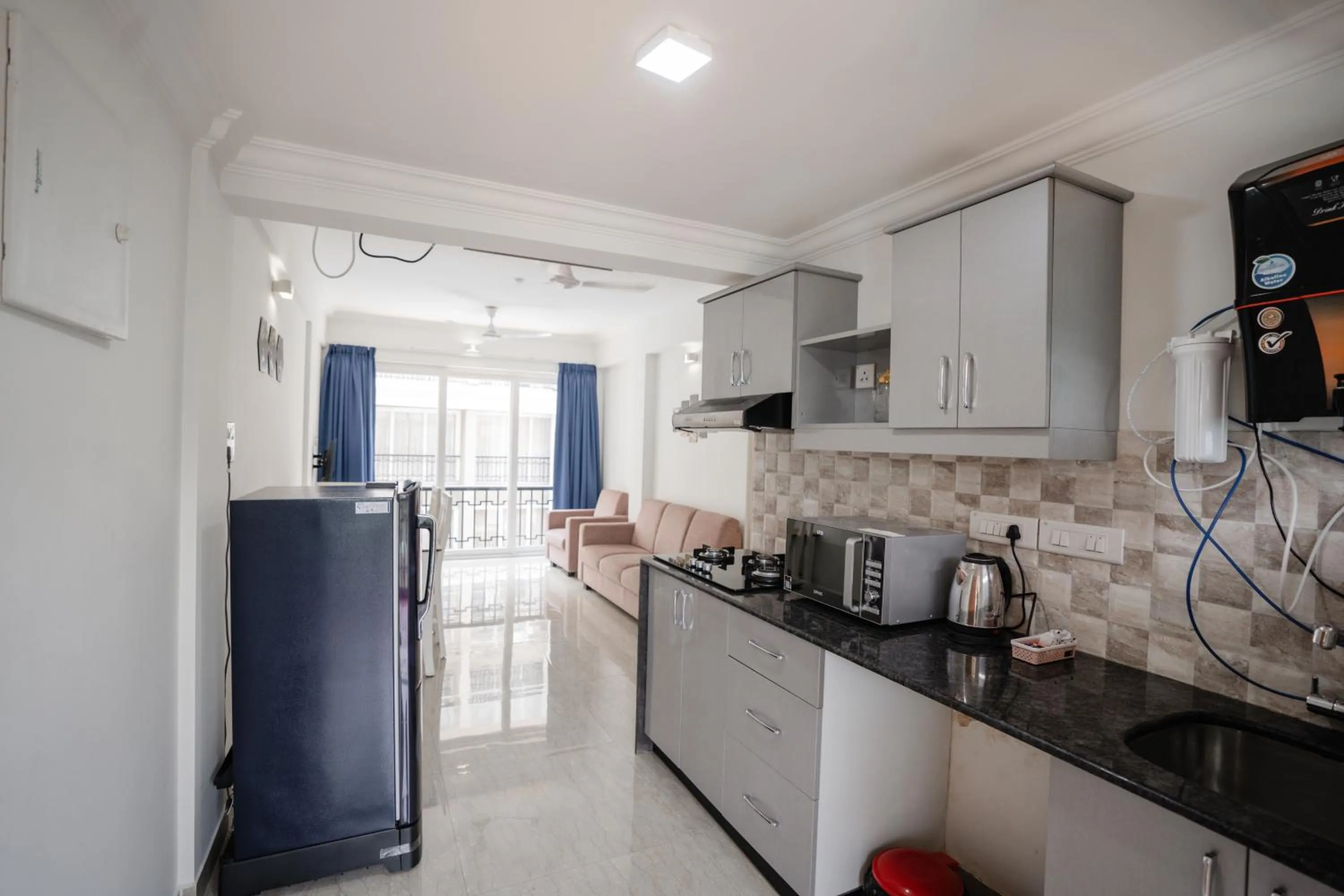 Kitchen or kitchenette in Bellagio Rezidencia 1 BHK Service Apartments