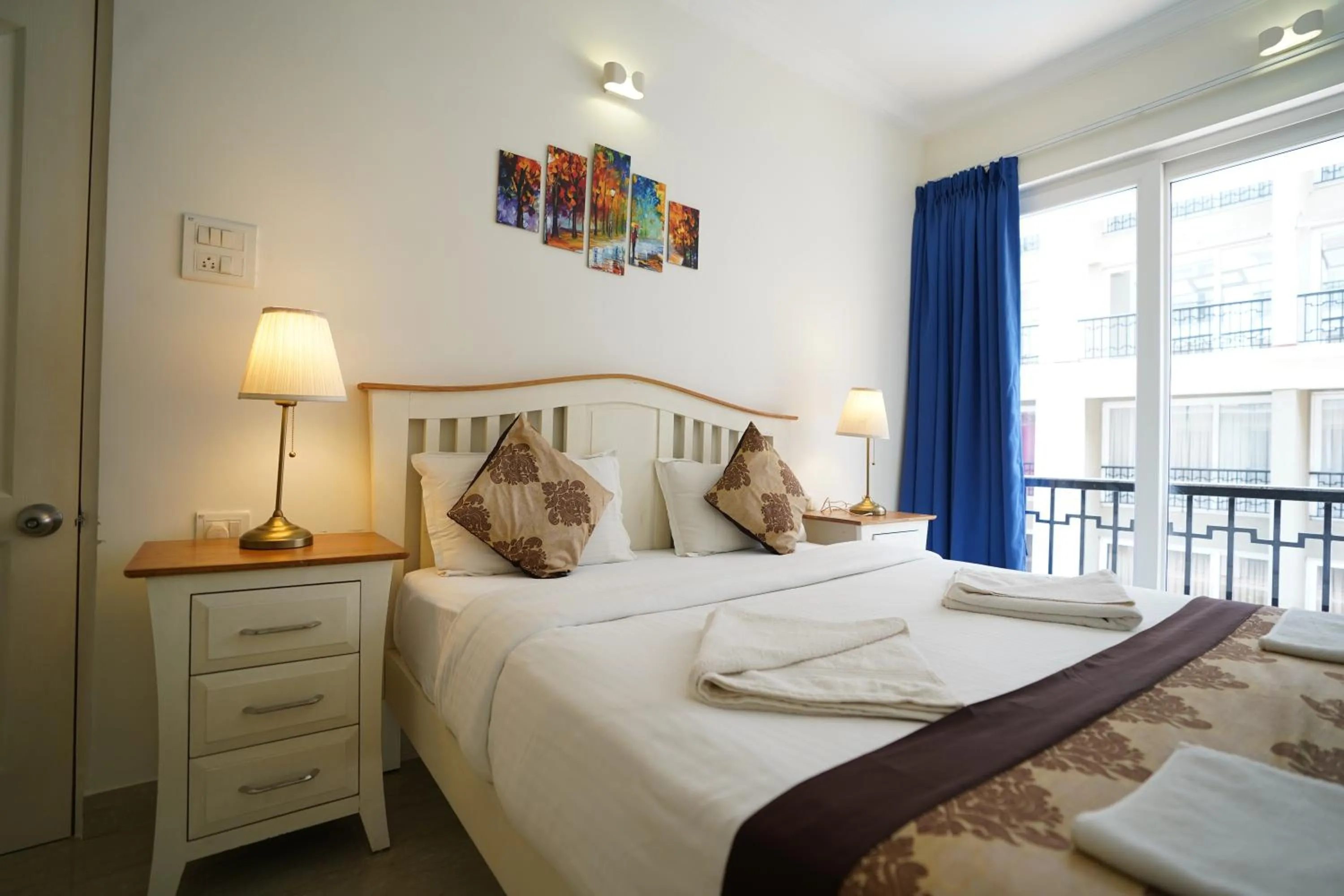 Bed in Bellagio Rezidencia 1 BHK Service Apartments