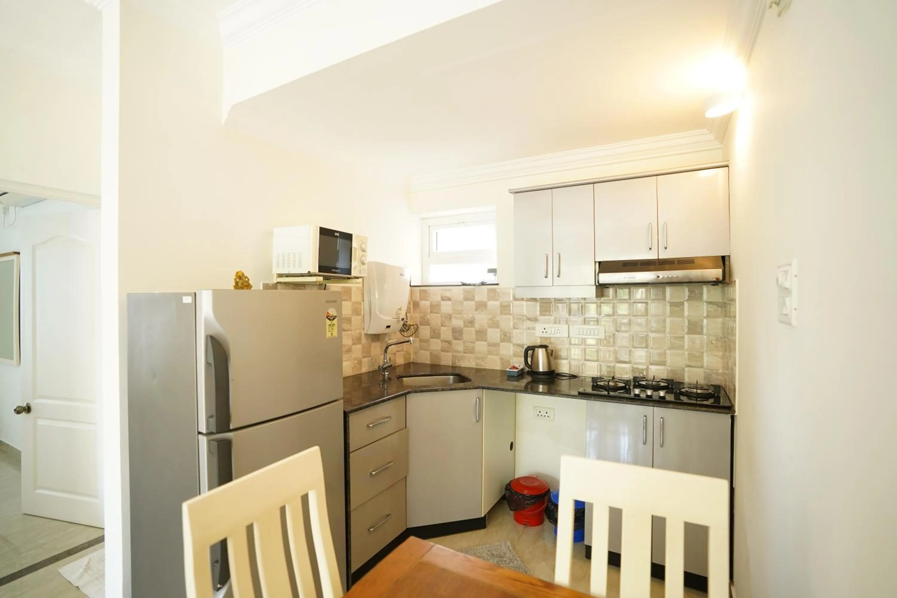 kitchen in Bellagio Rezidencia 1 BHK Service Apartments
