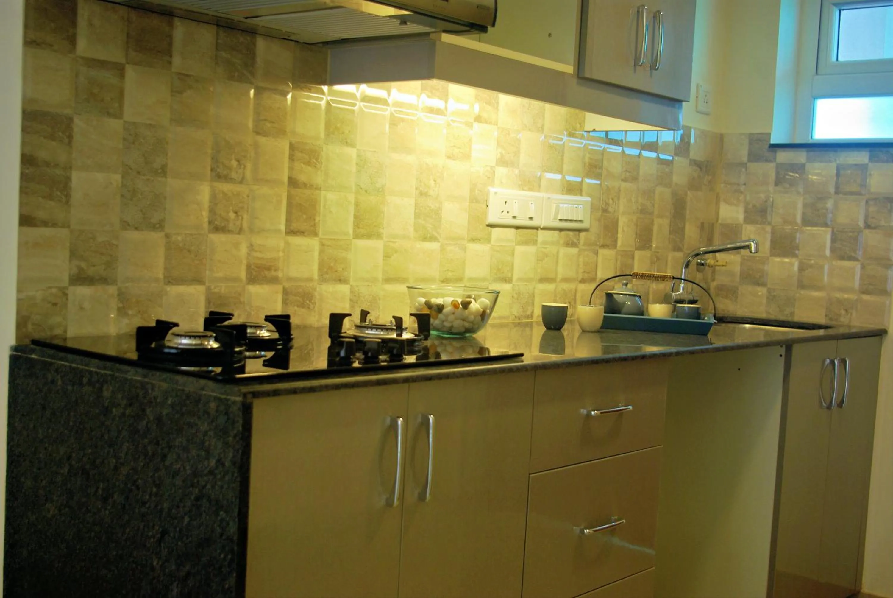 kitchen in Bellagio Rezidencia 1 BHK Service Apartments