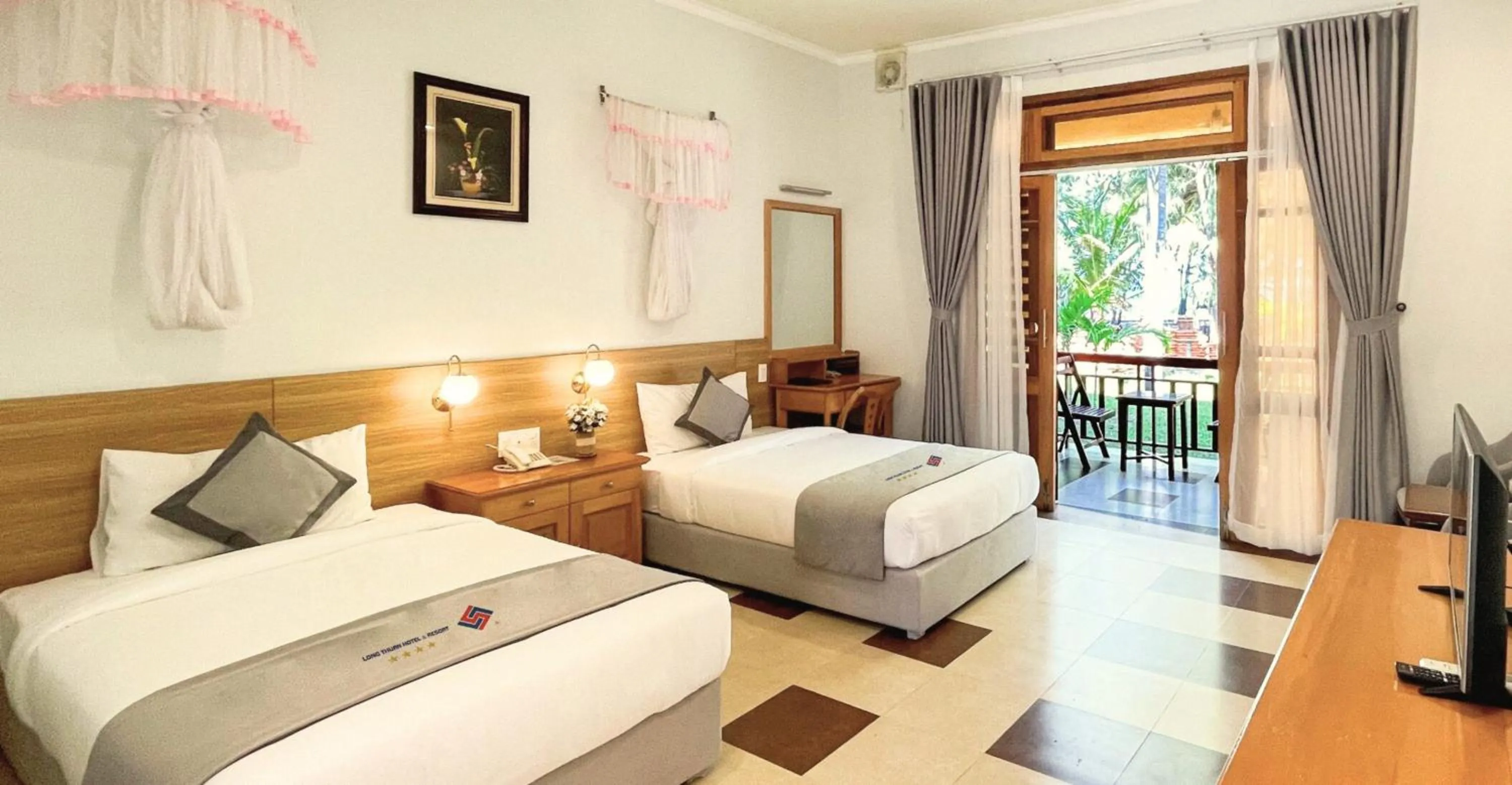 Bed in Long Thuan Hotel & Resort