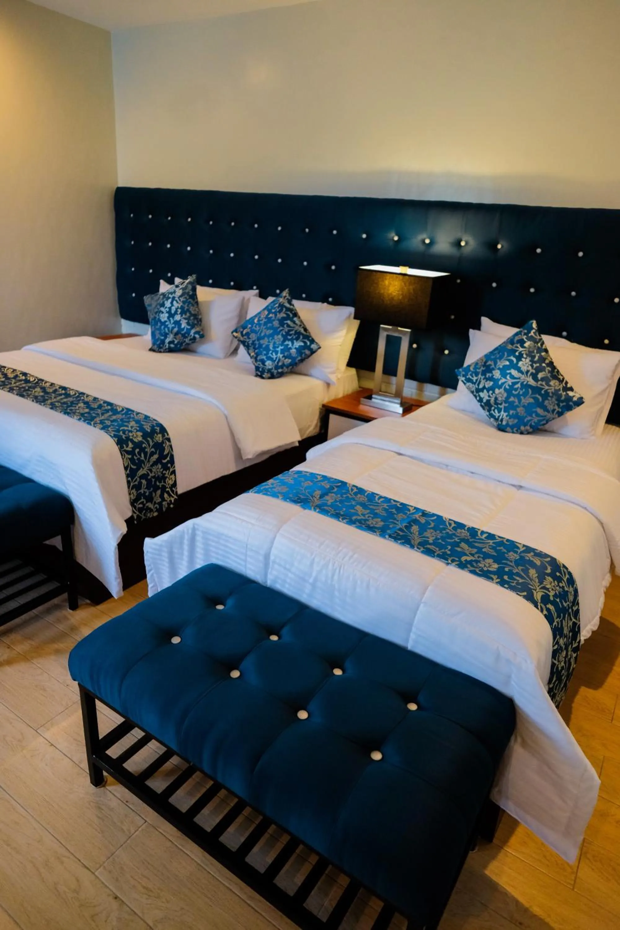 Bed in The Madeline Boutique Hotel & Suites