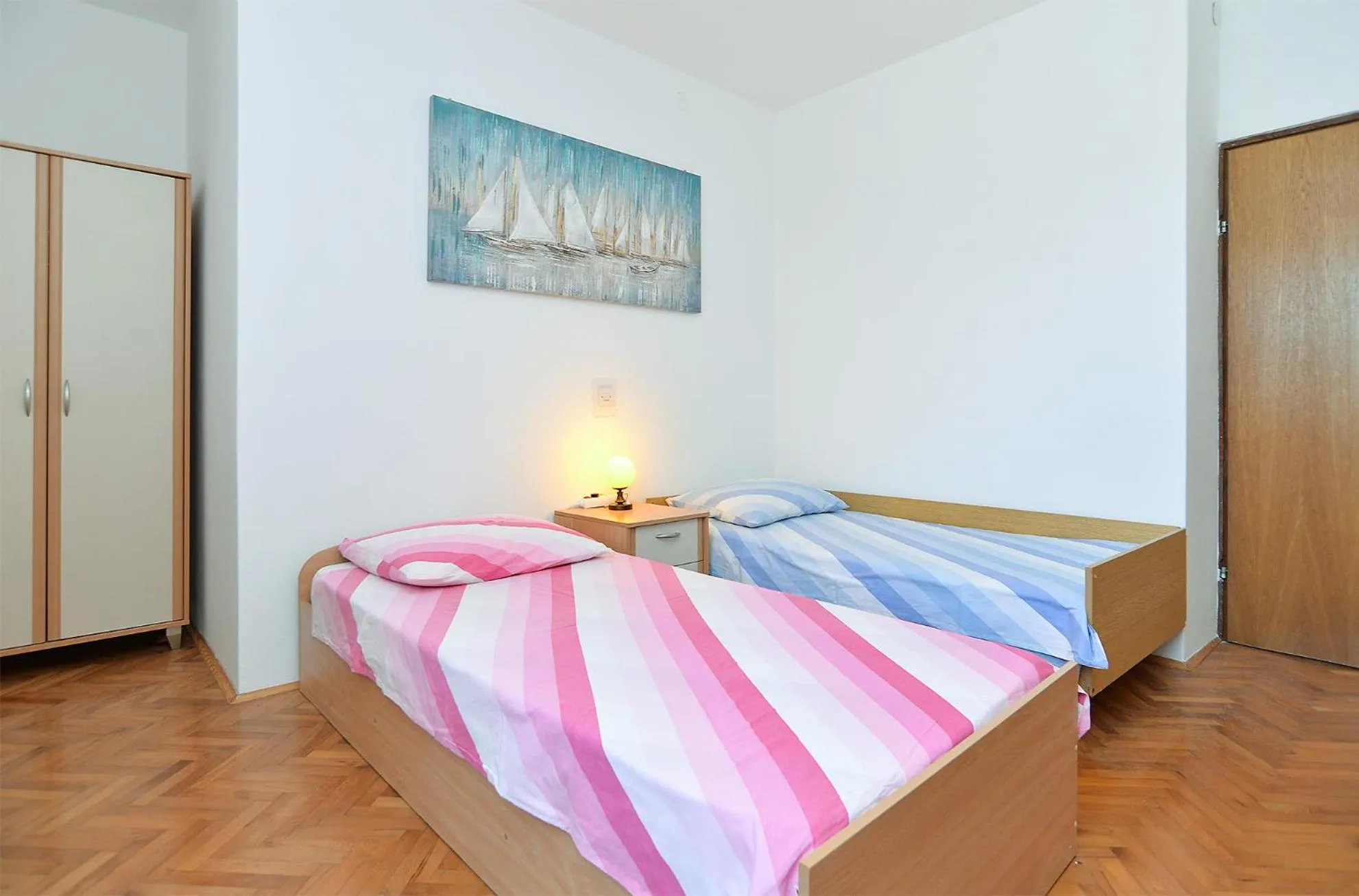 Bed in Apartments Irena 531