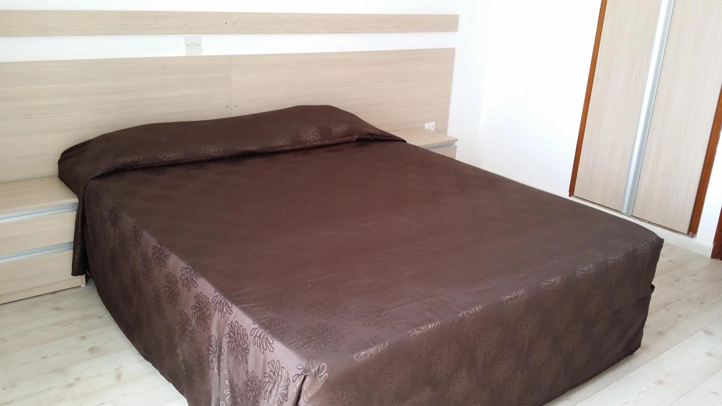 Bed in Agrino Hotel Apartments