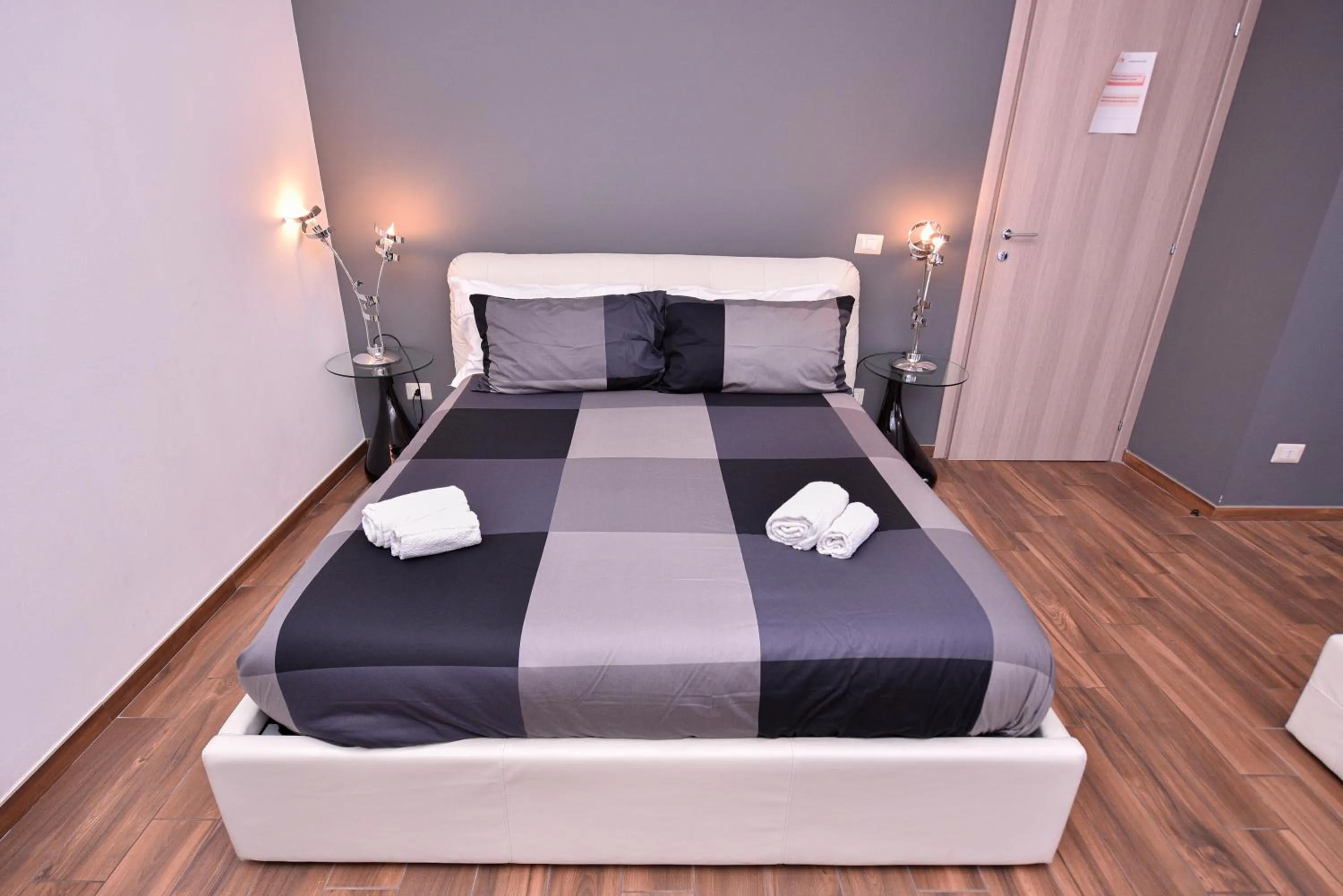 Bed in Symposium Bed&Breakfast