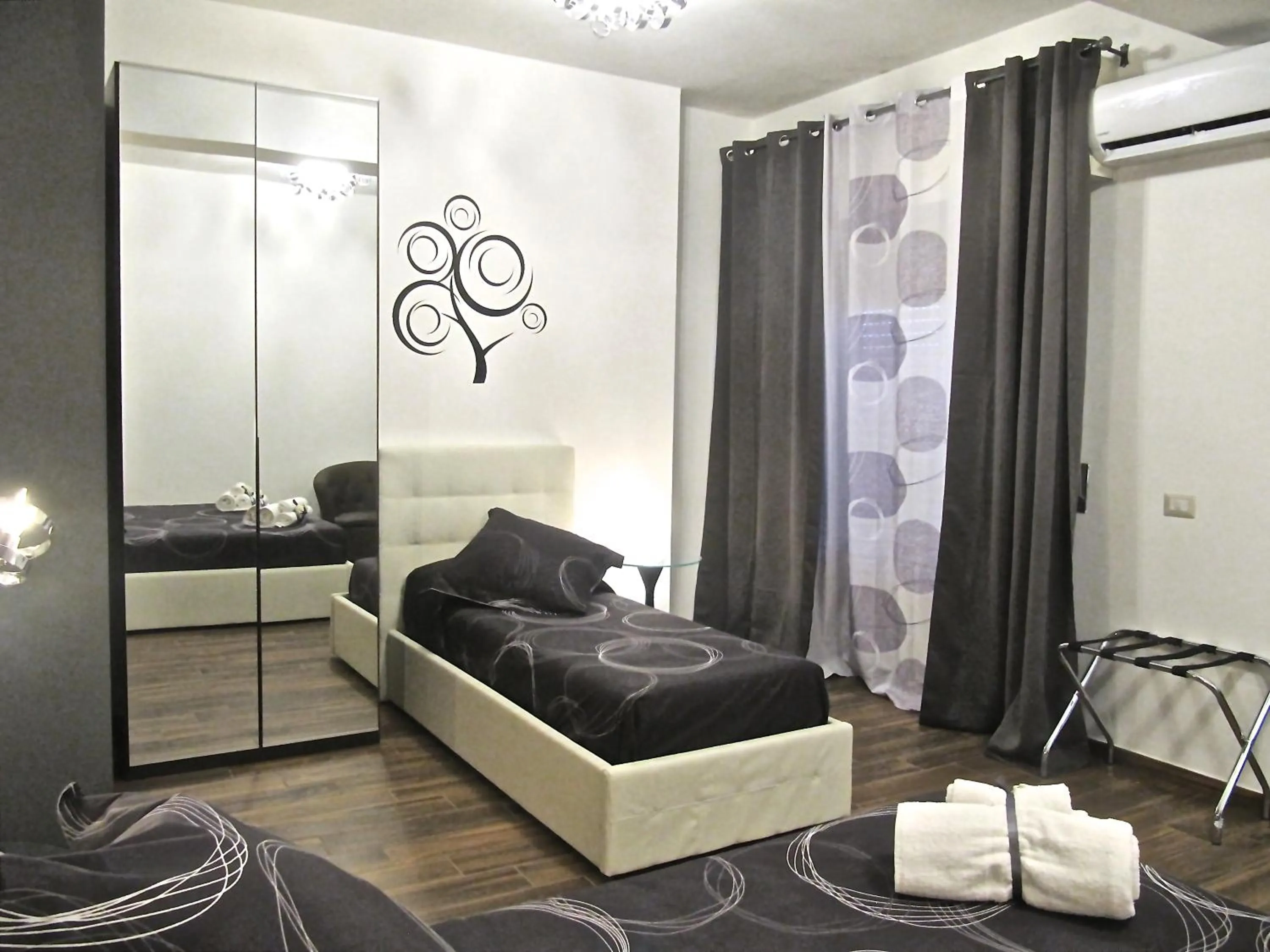 Bed in Symposium Bed&Breakfast