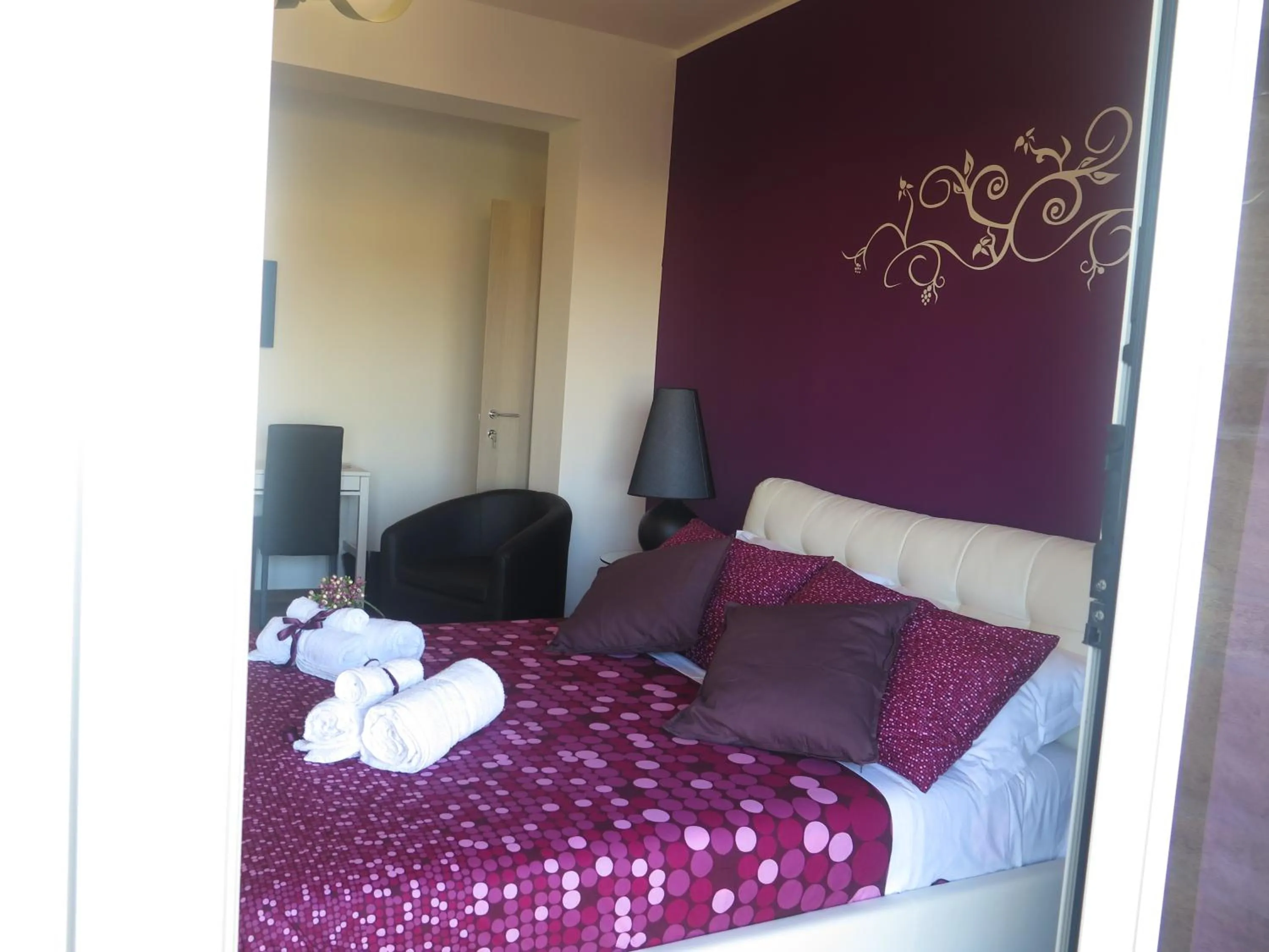 Bed in Symposium Bed&Breakfast