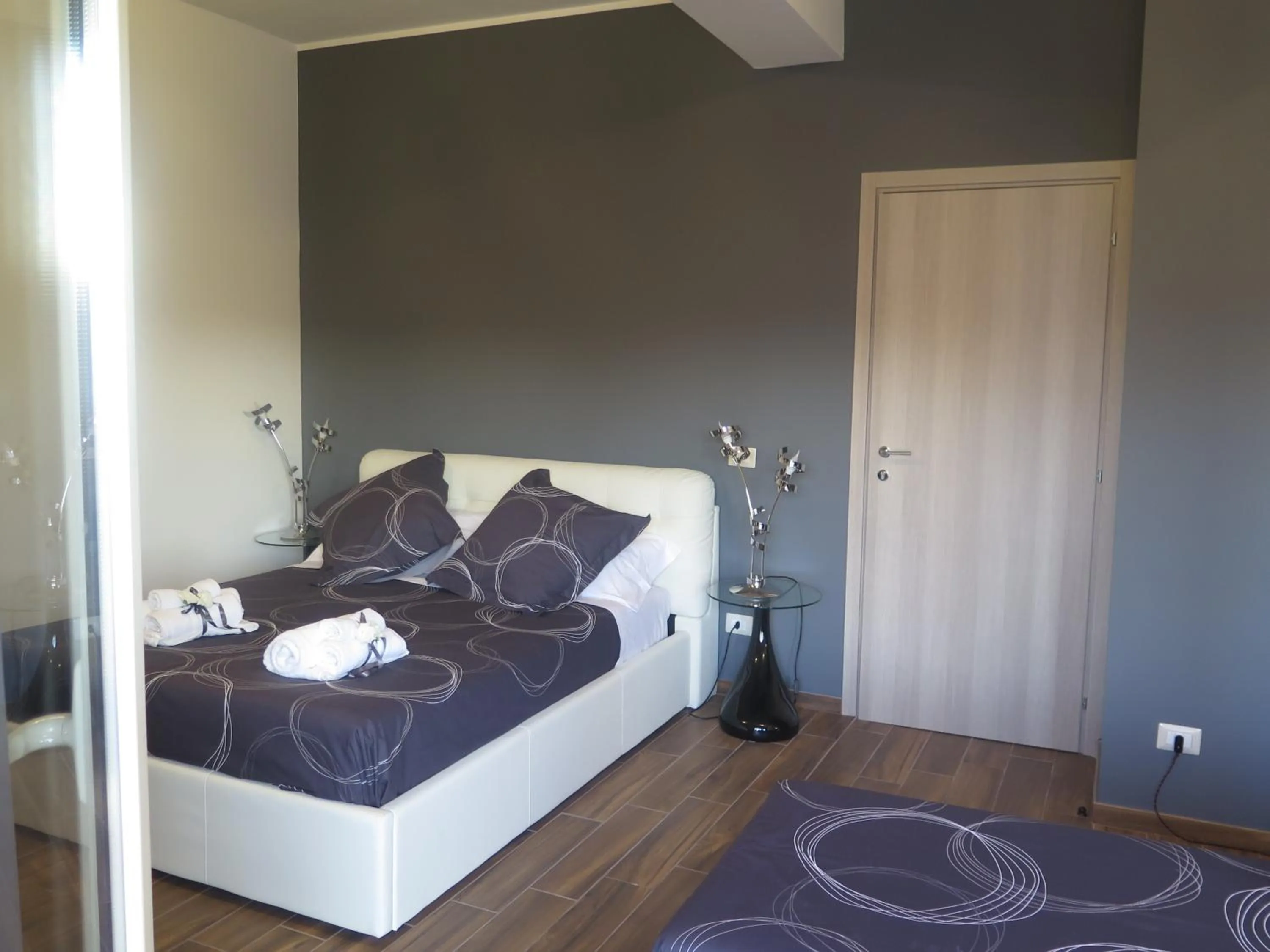 Bed in Symposium Bed&Breakfast