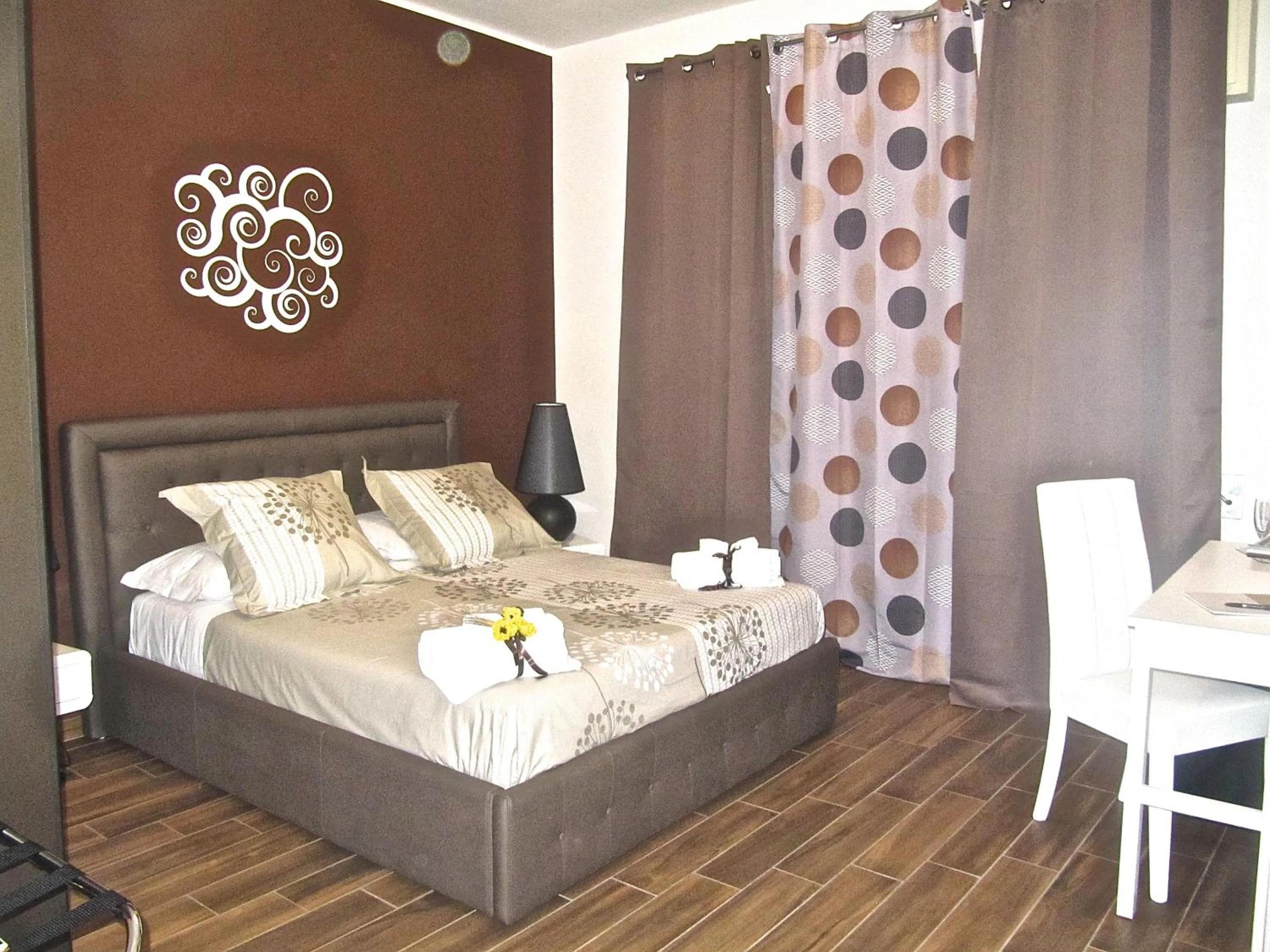 Bed in Symposium Bed&Breakfast