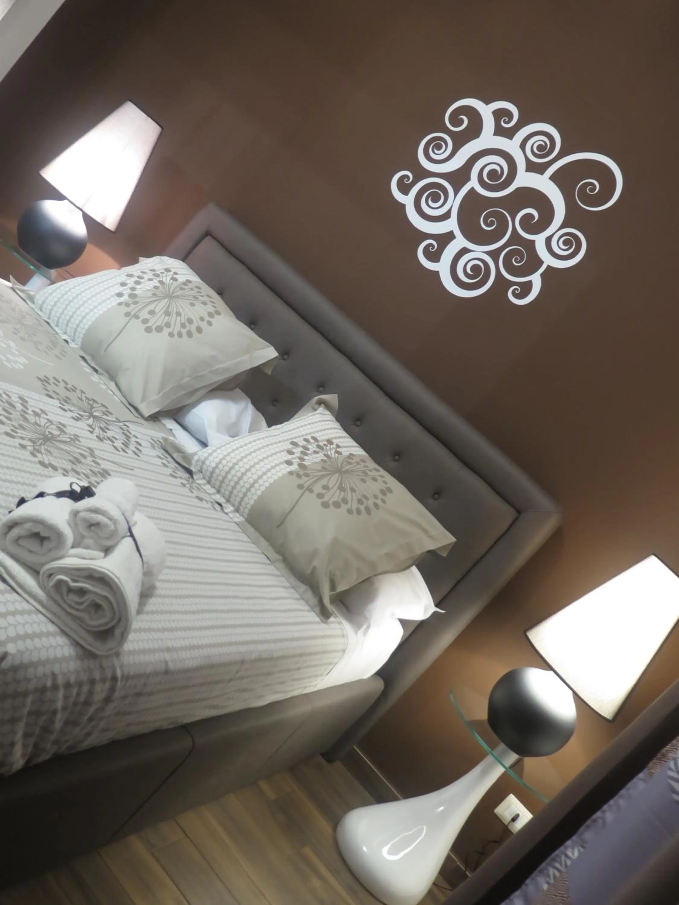 Bed in Symposium Bed&Breakfast