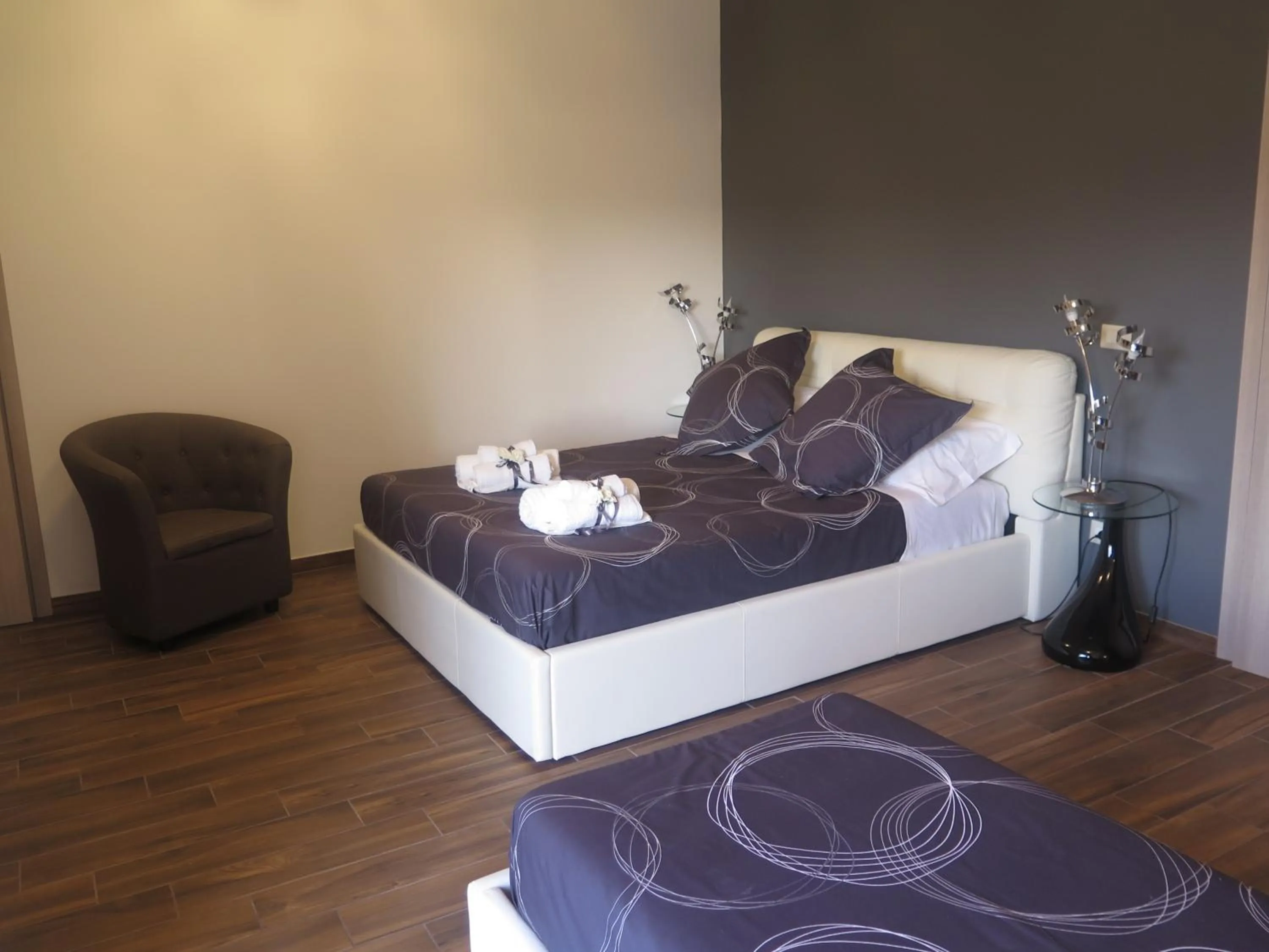 Bed in Symposium Bed&Breakfast