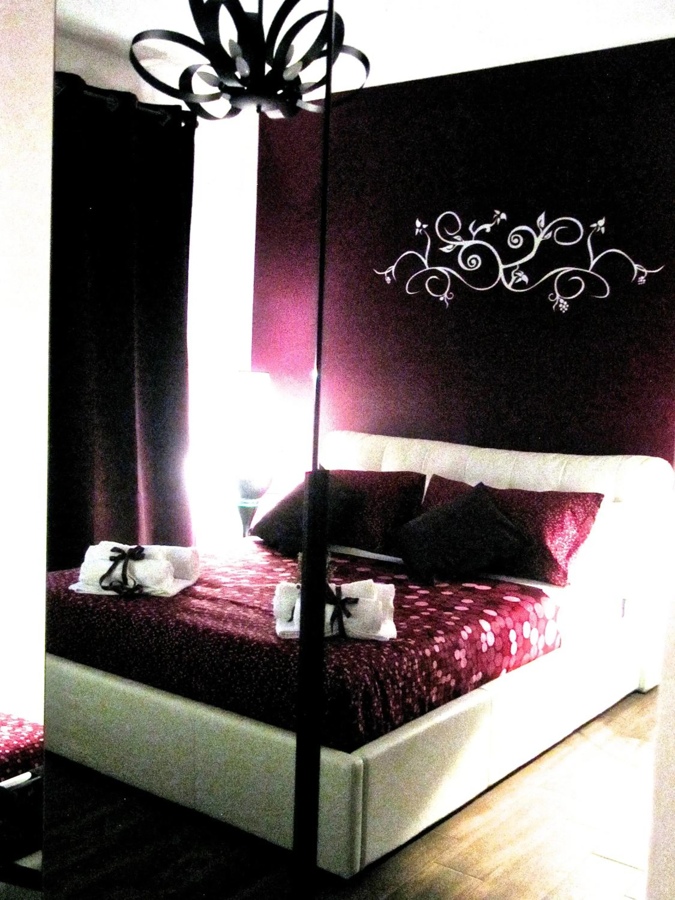 Bed in Symposium Bed&Breakfast