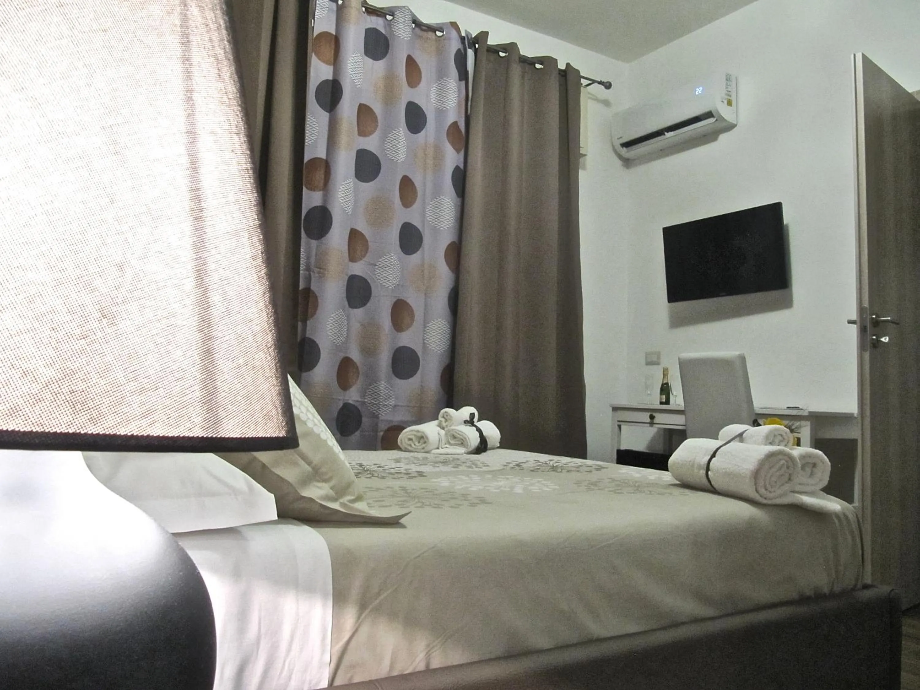 Bed in Symposium Bed&Breakfast