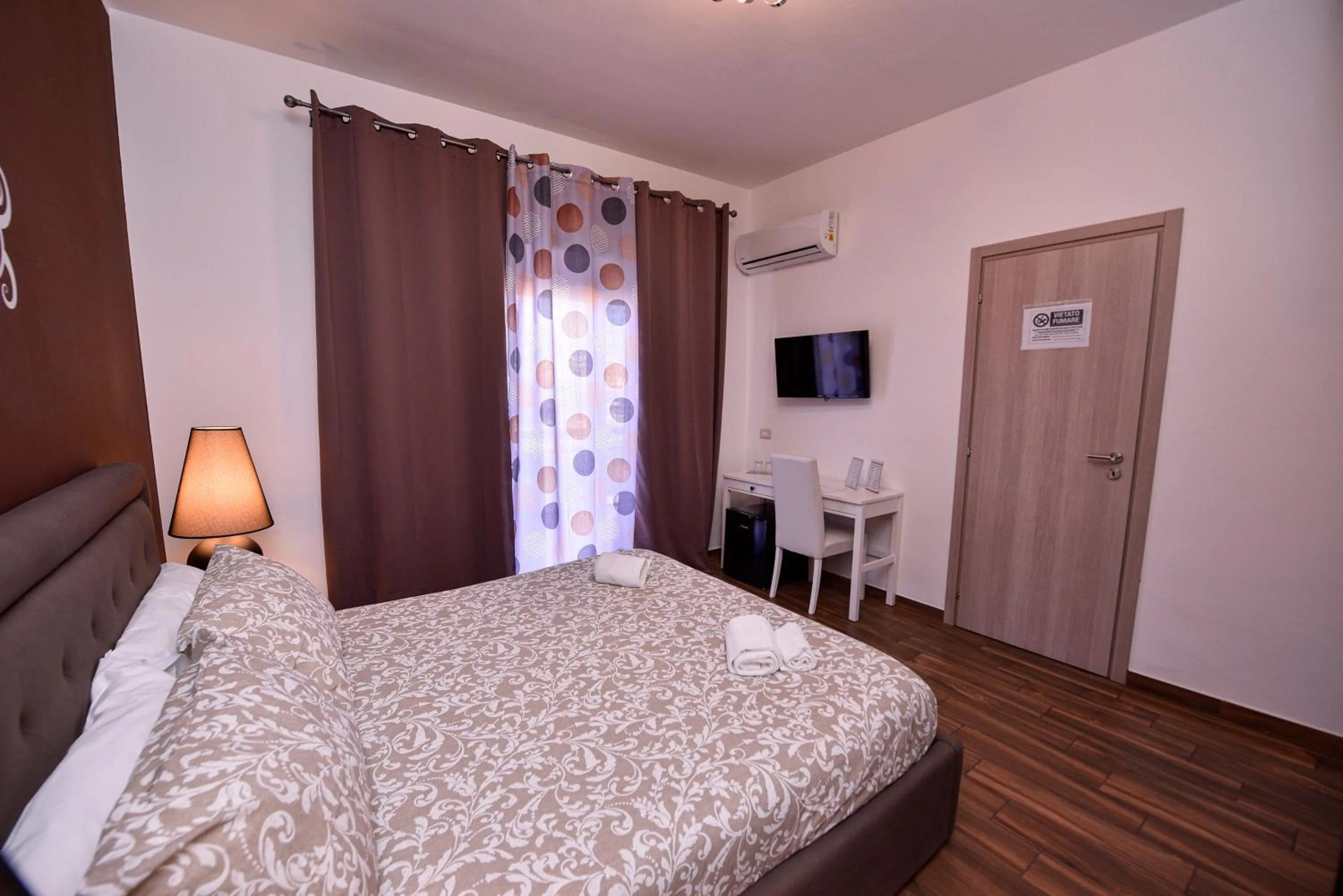 Bed in Symposium Bed&Breakfast