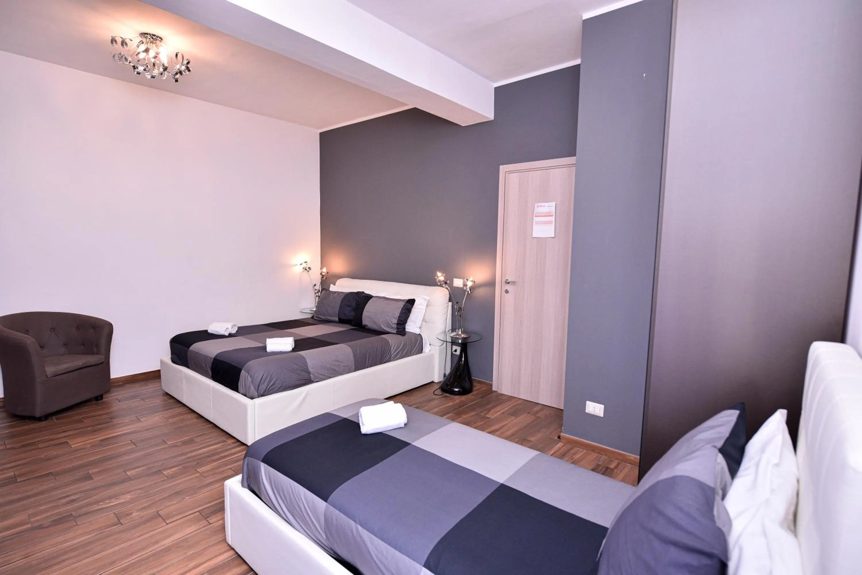 Bed in Symposium Bed&Breakfast