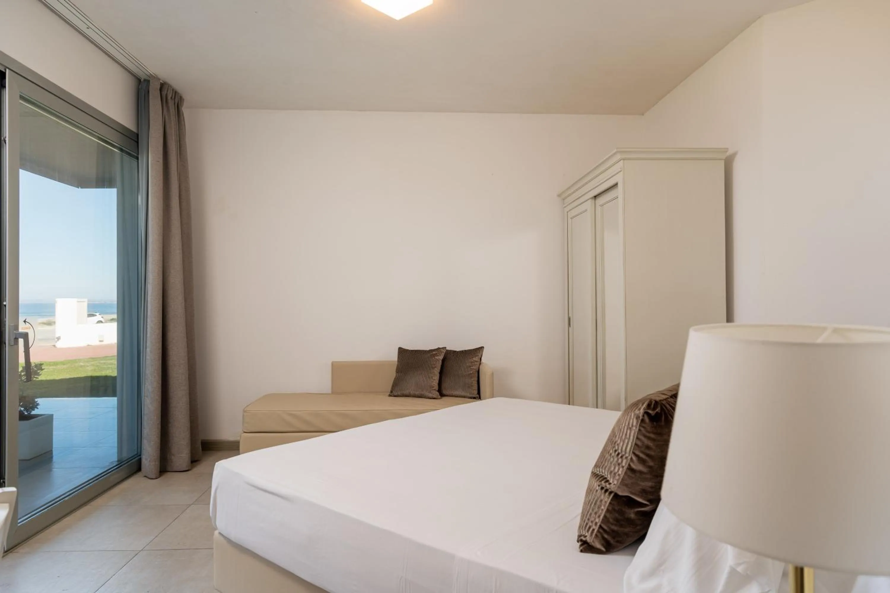 Bed in Bellevue Sardinia Resort Affiliated by Meliá