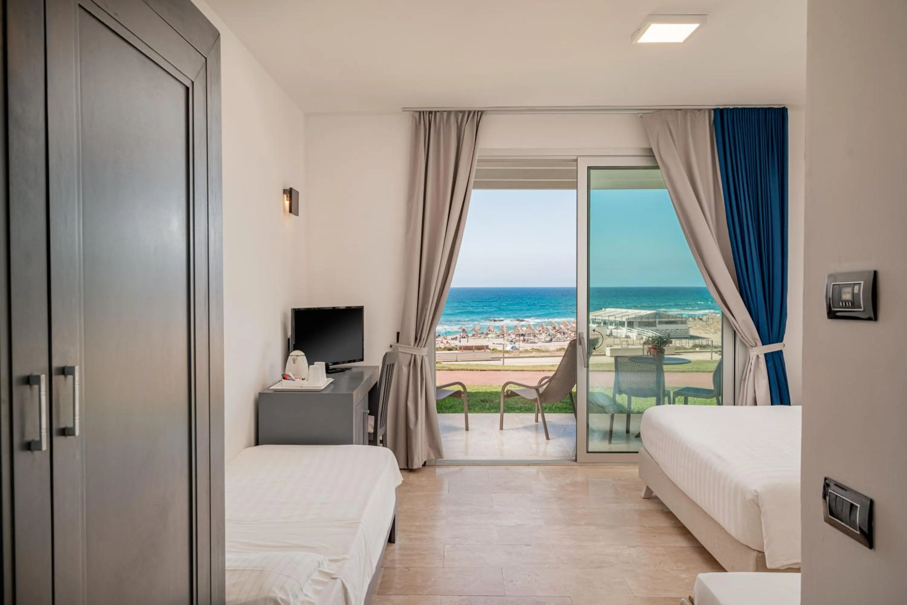 Bed in Bellevue Sardinia Resort Affiliated by Meliá