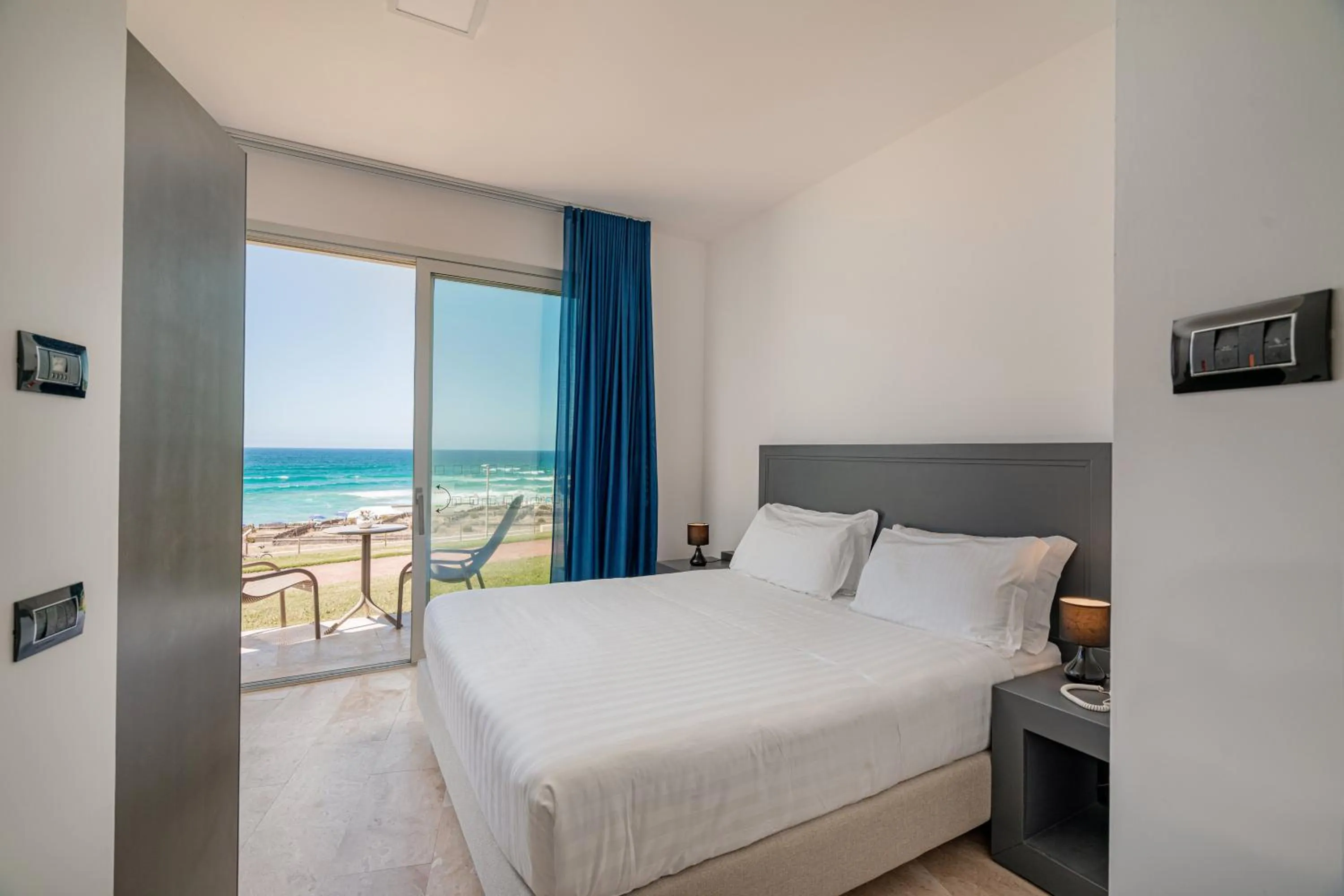 Bed in Bellevue Sardinia Resort Affiliated by Meliá