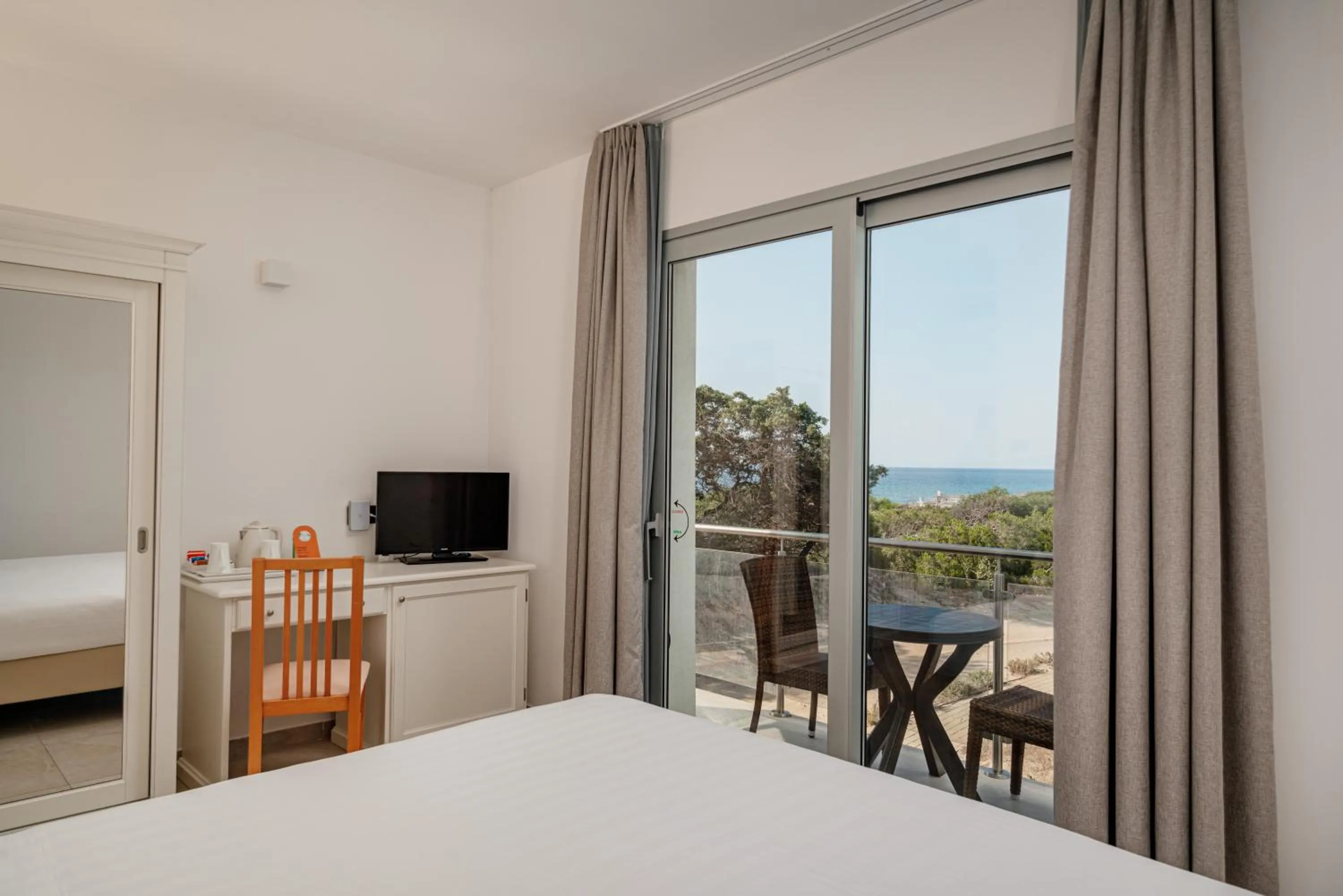 Bed in Bellevue Sardinia Resort Affiliated by Meliá