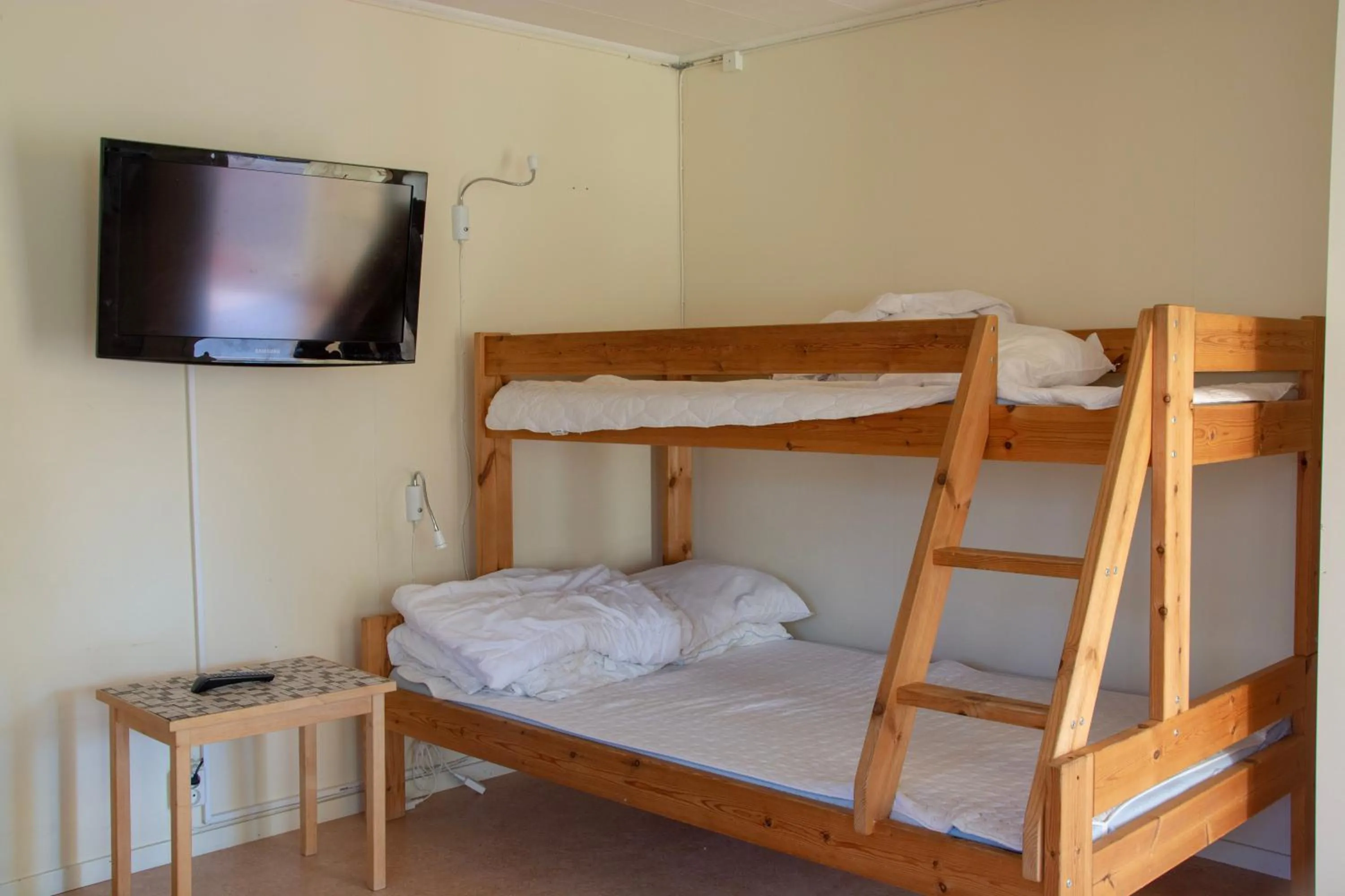 Communal lounge/ TV room, Bed in Älvdalens Camping