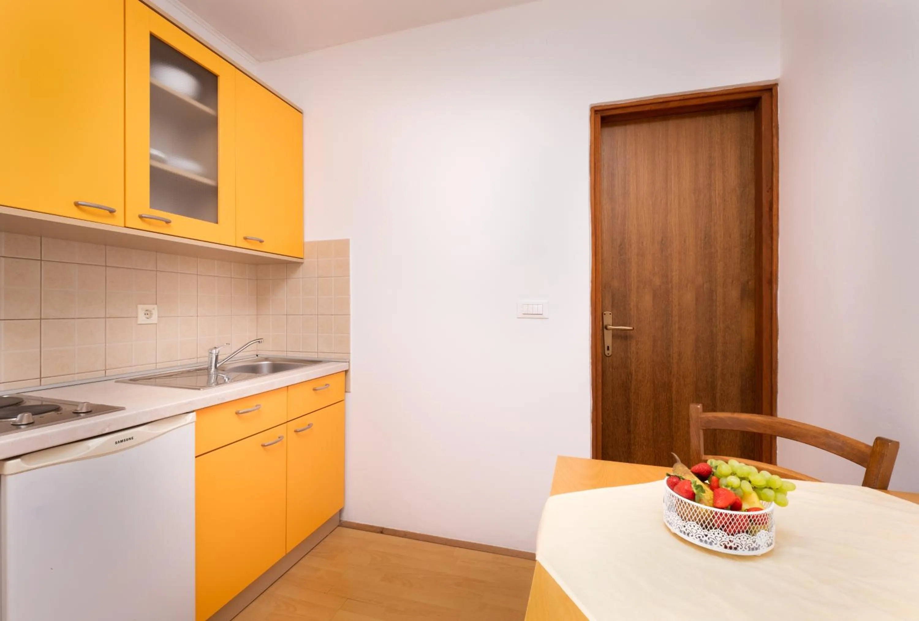 Kitchen or kitchenette in Apartments Katica