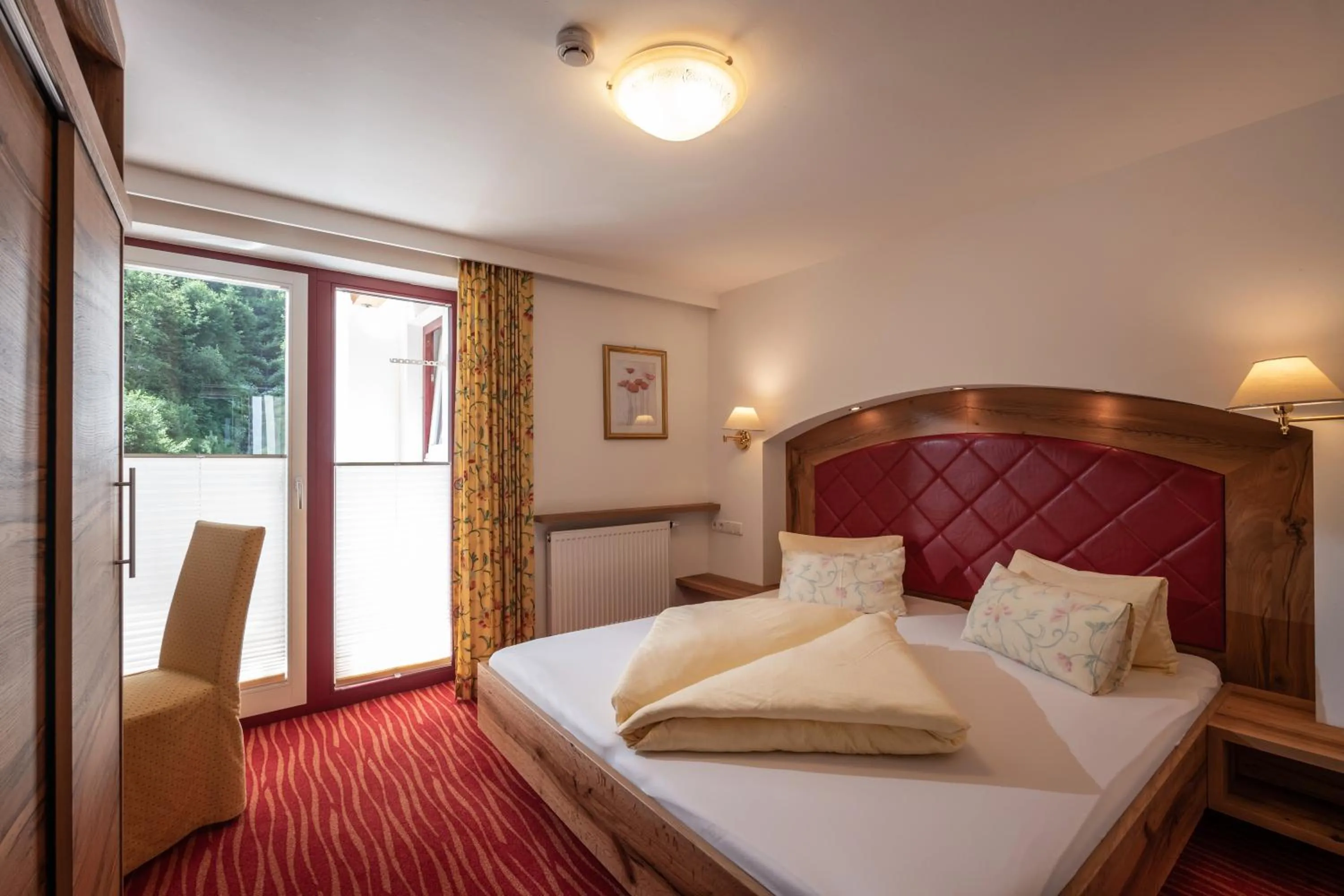 Bed in alpenrose hotel-garni