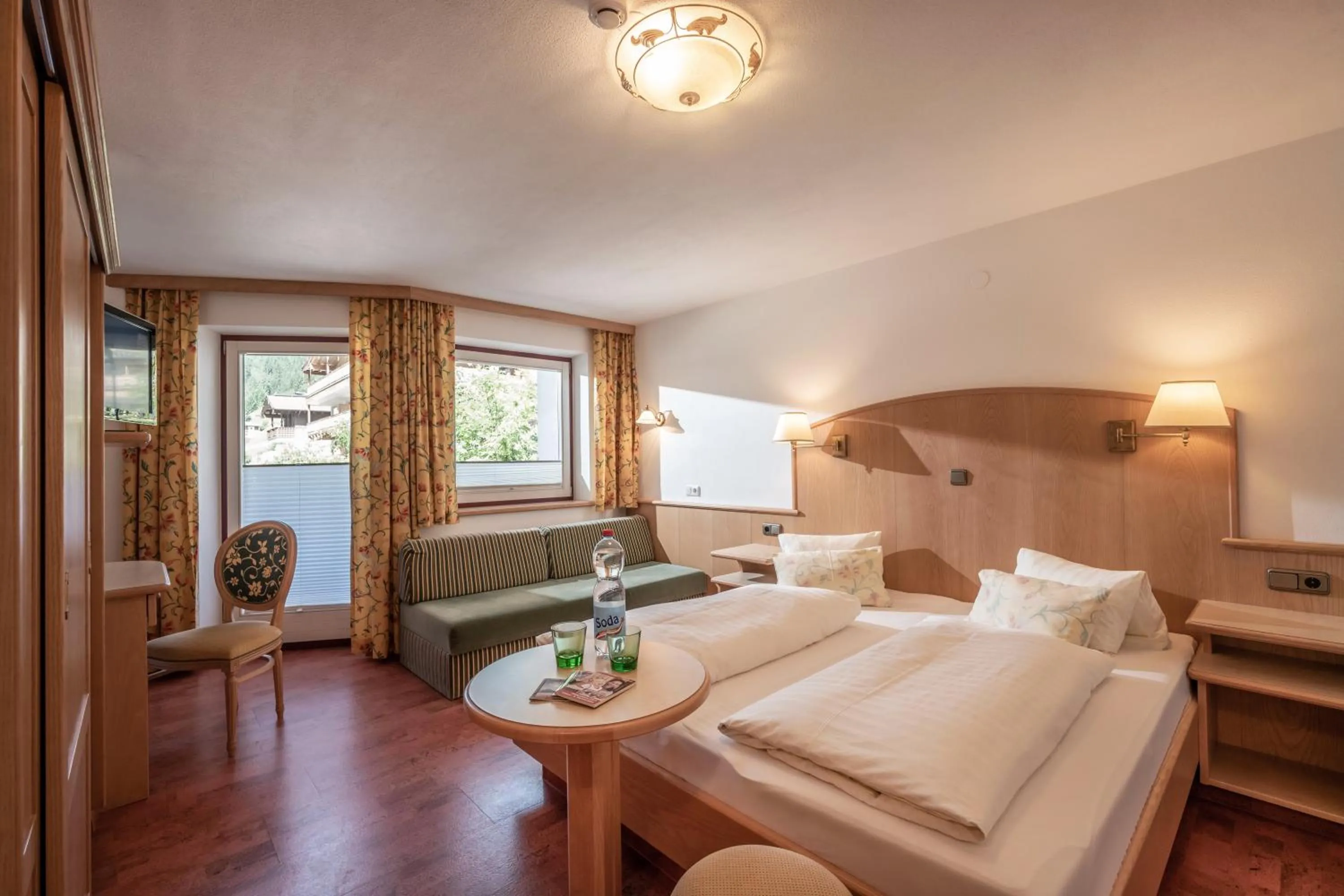 Photo of the whole room, Bed in alpenrose hotel-garni